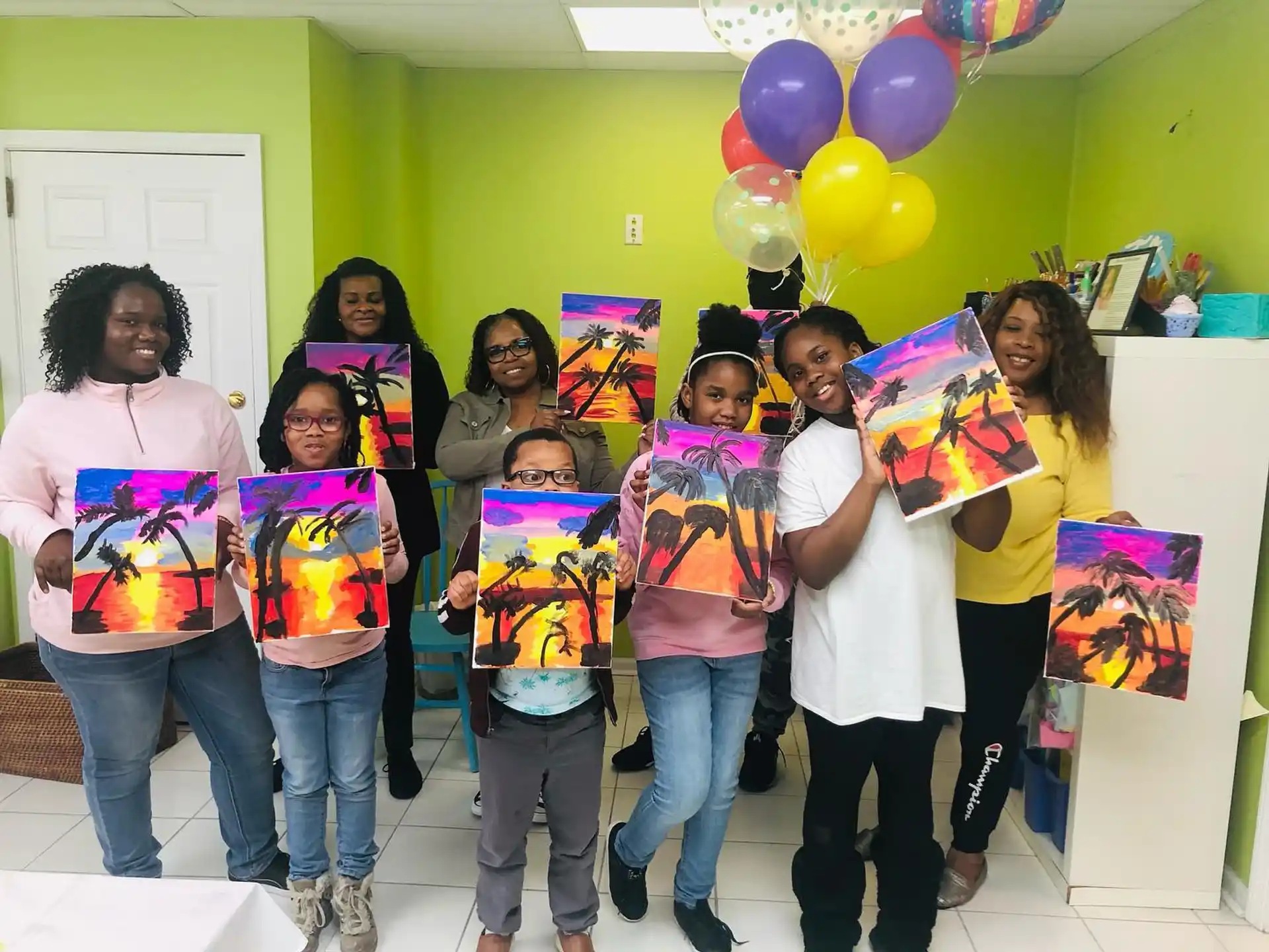 a group of people holding balloons