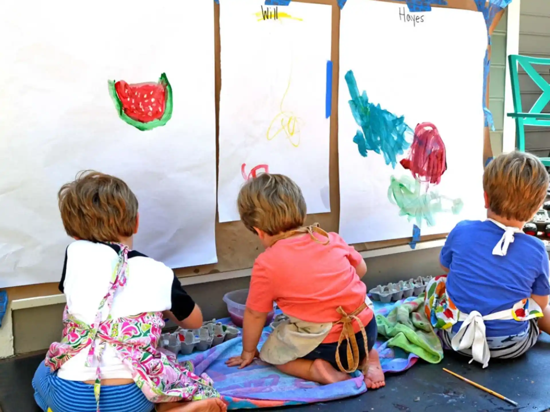 a group of children sitting on the floor