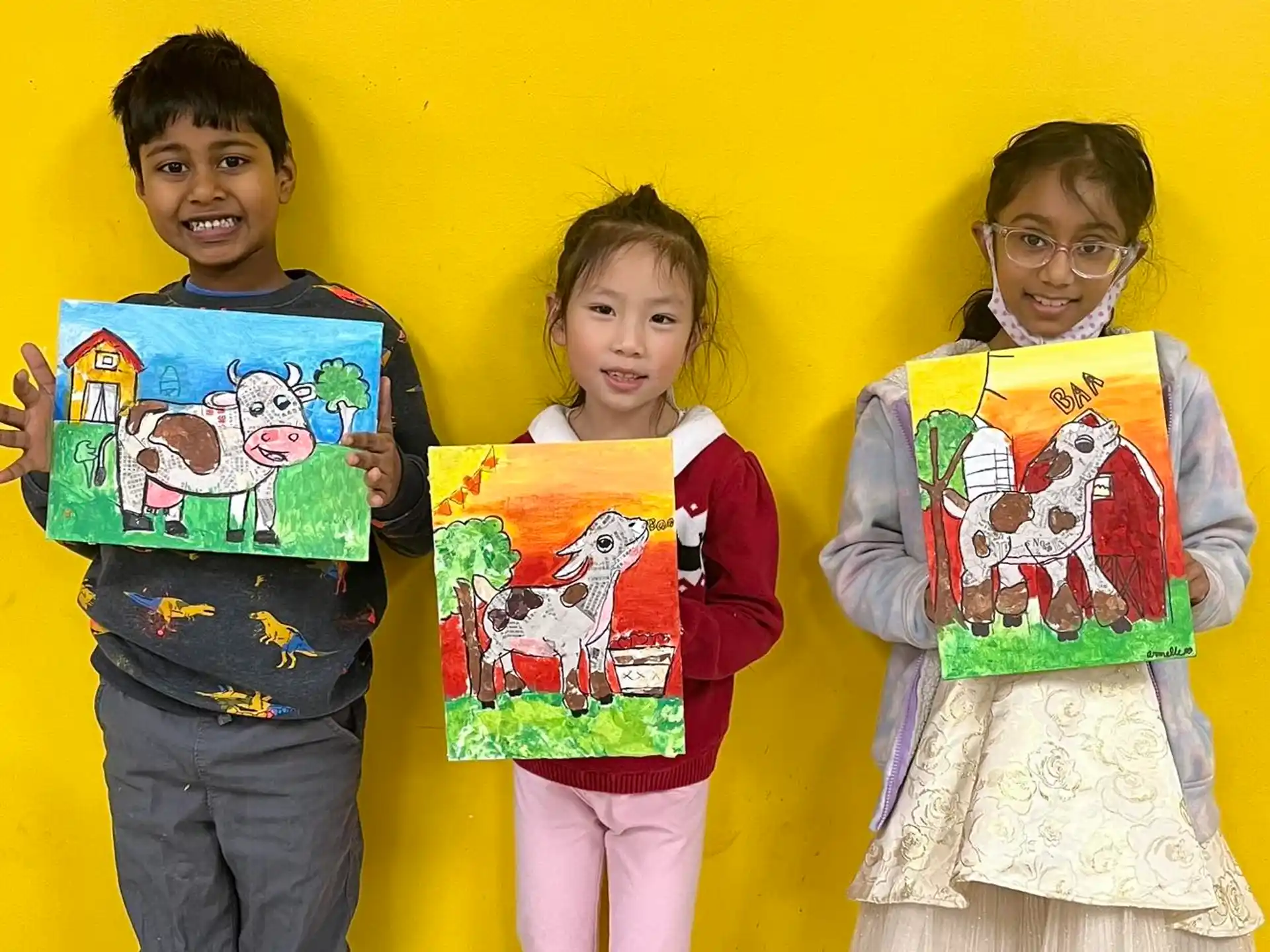 a group of children holding books
