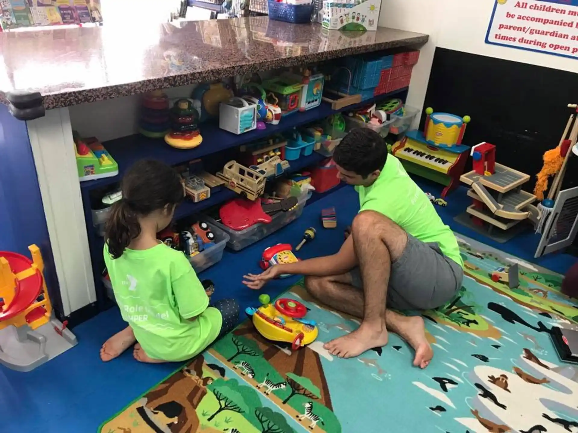 a few children playing on the floor