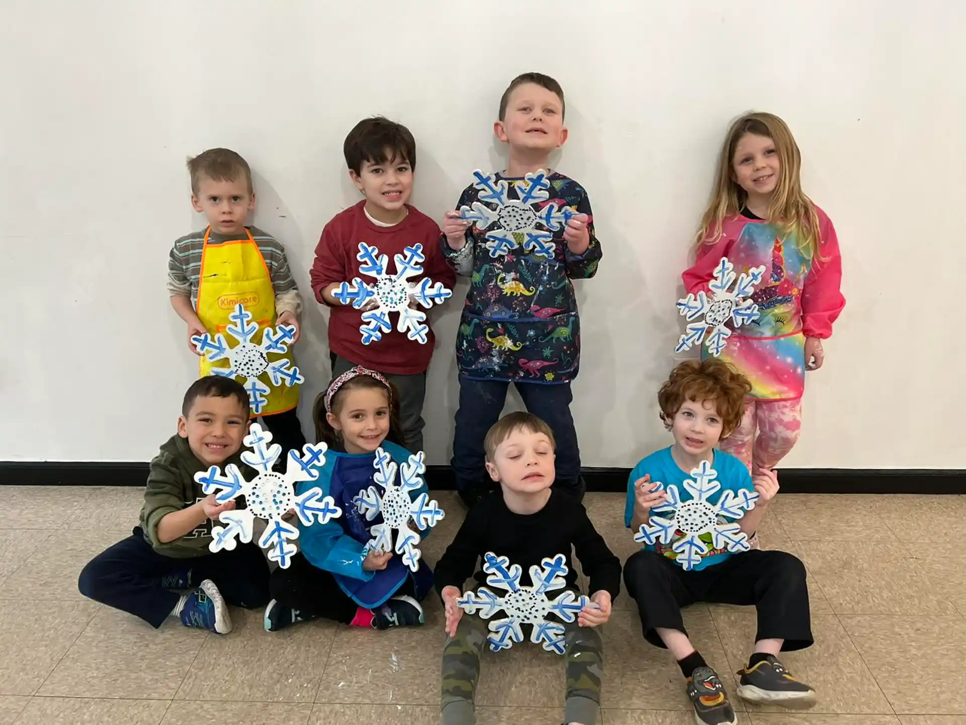 a group of children posing for a photo