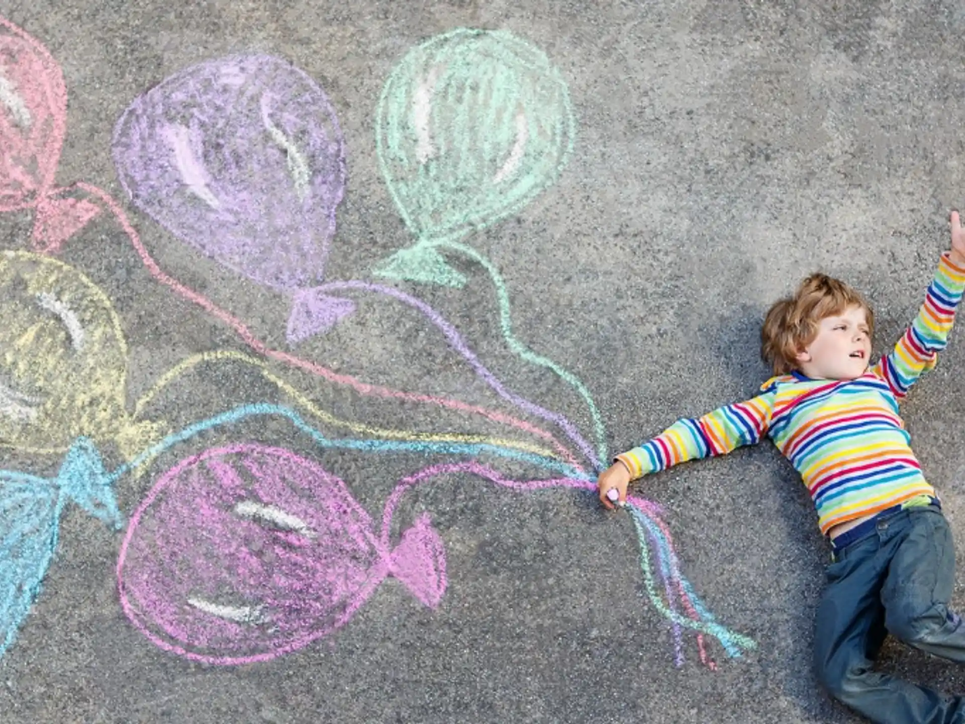 a child playing with a drawing