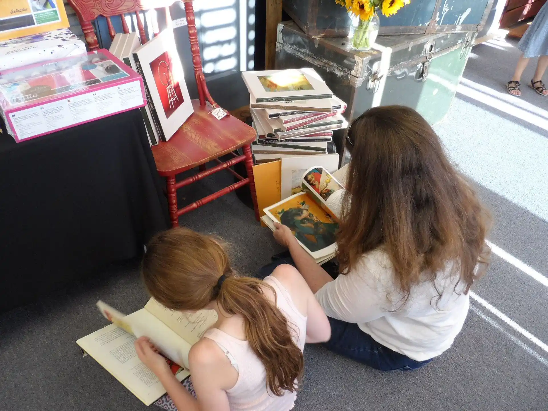 a couple of girls reading books