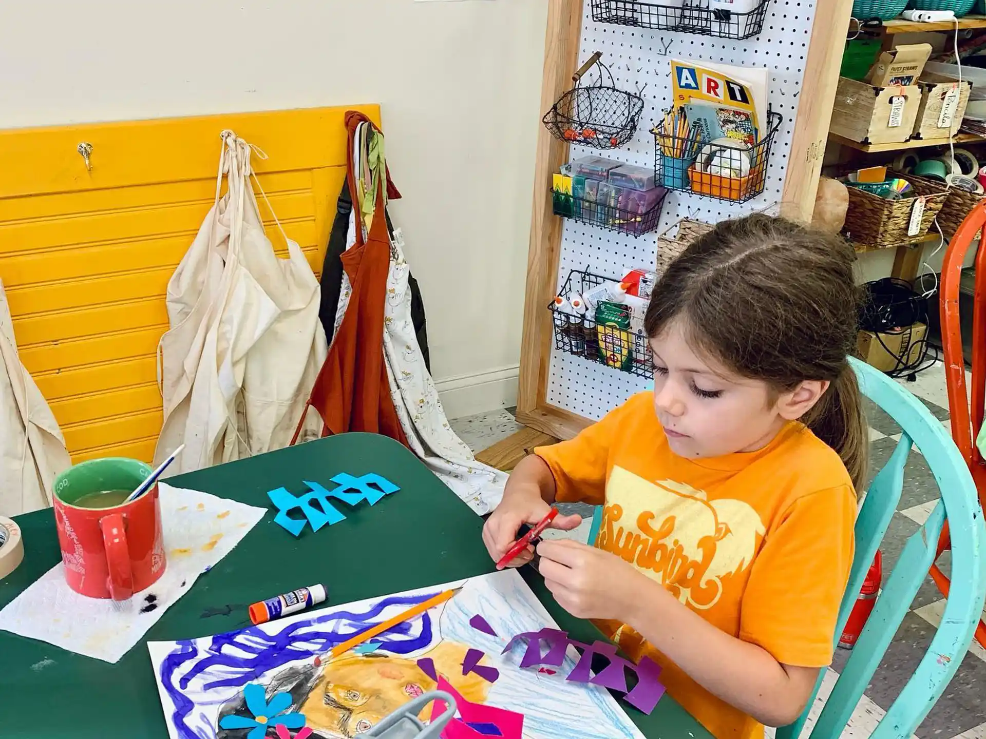 a child sitting at a table