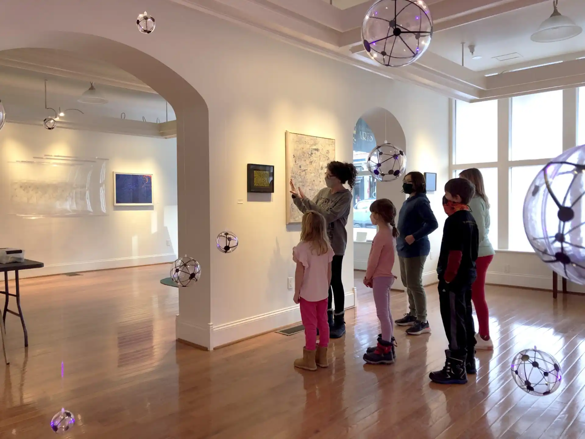 a group of people standing in a room