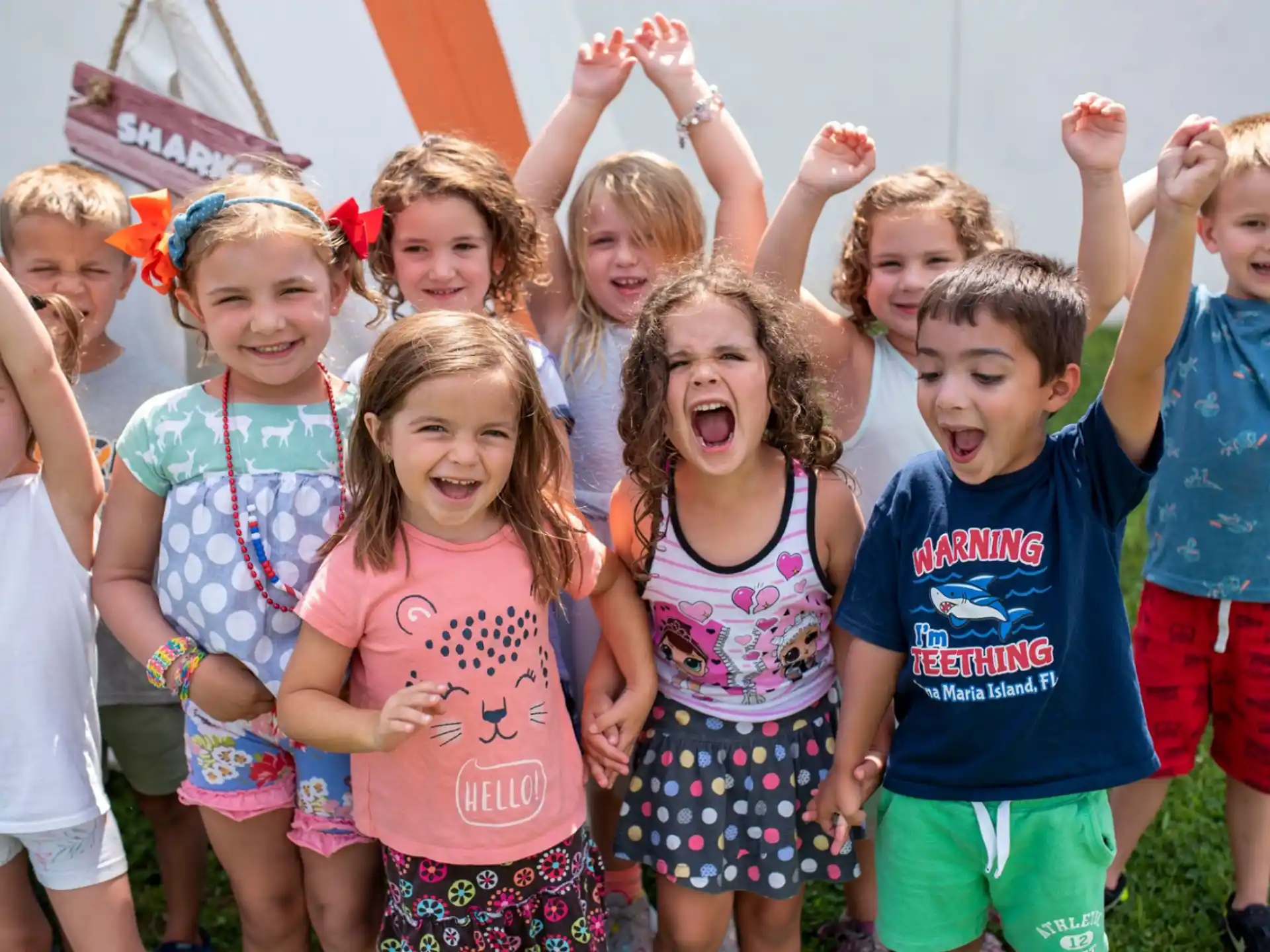 a group of children posing for a photo