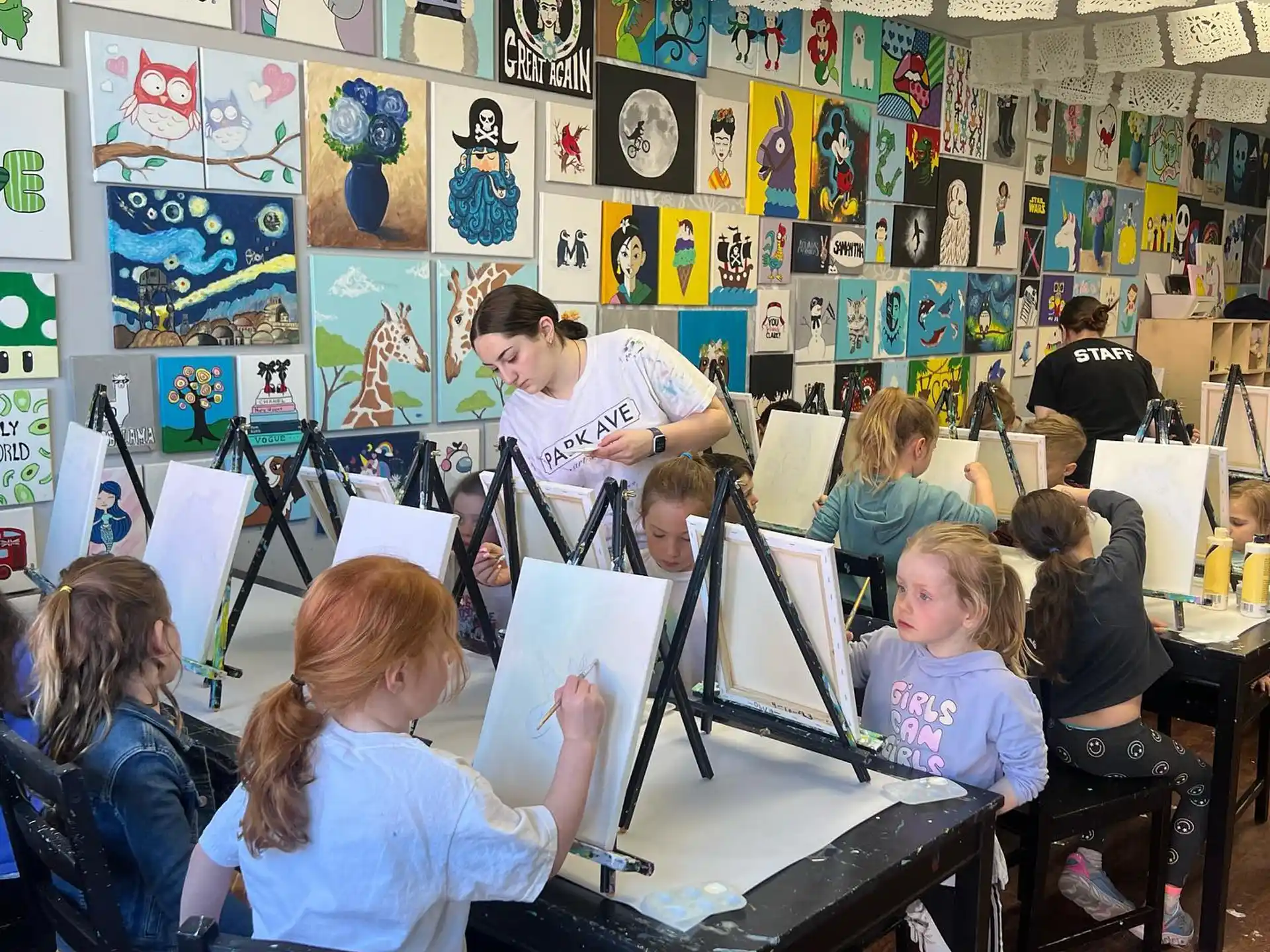 a person teaching children in a classroom