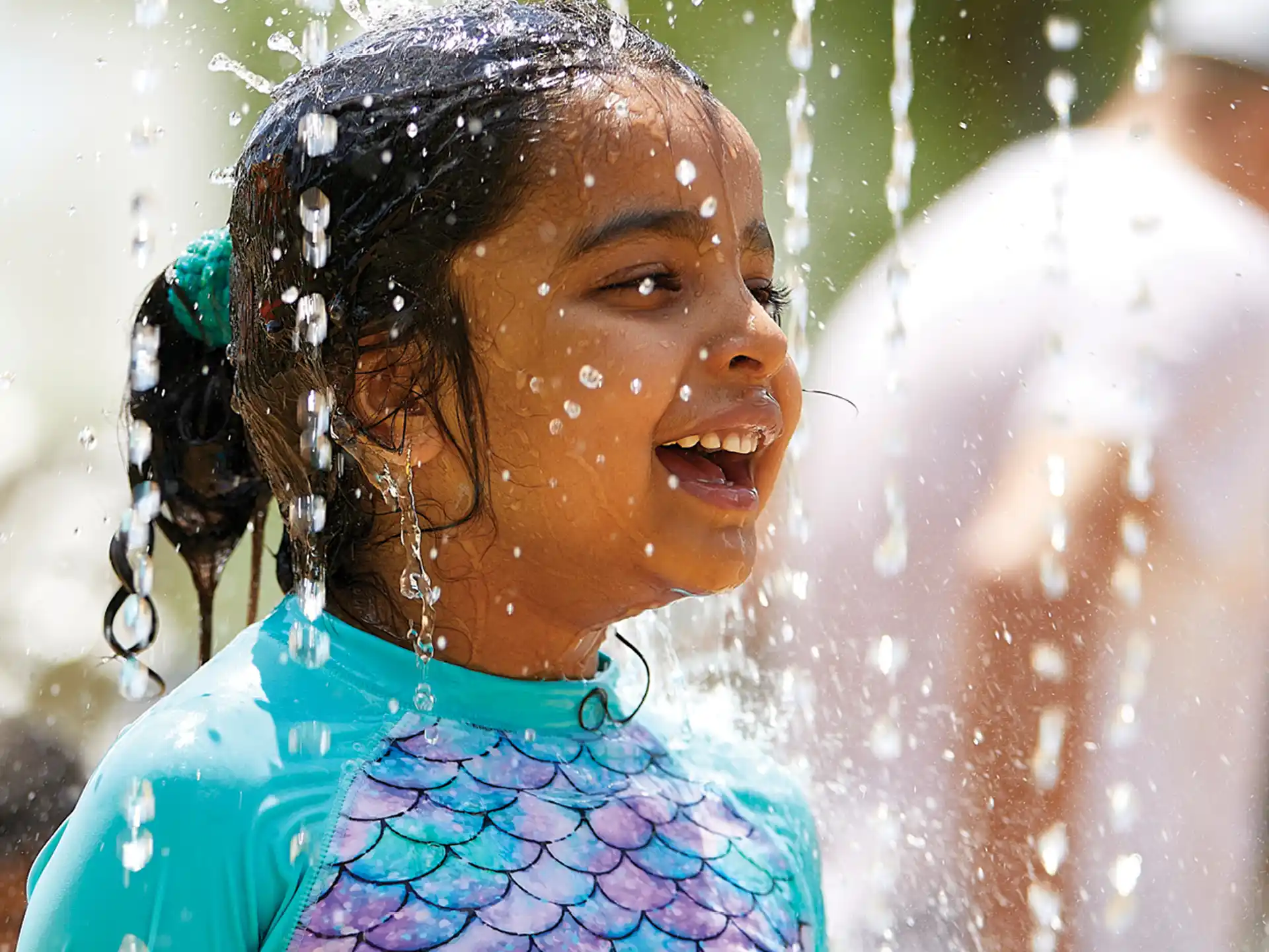 a person with water droplets on the face