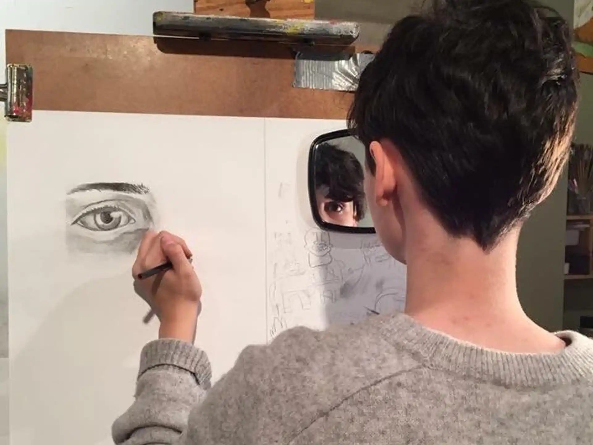 a man painting a picture