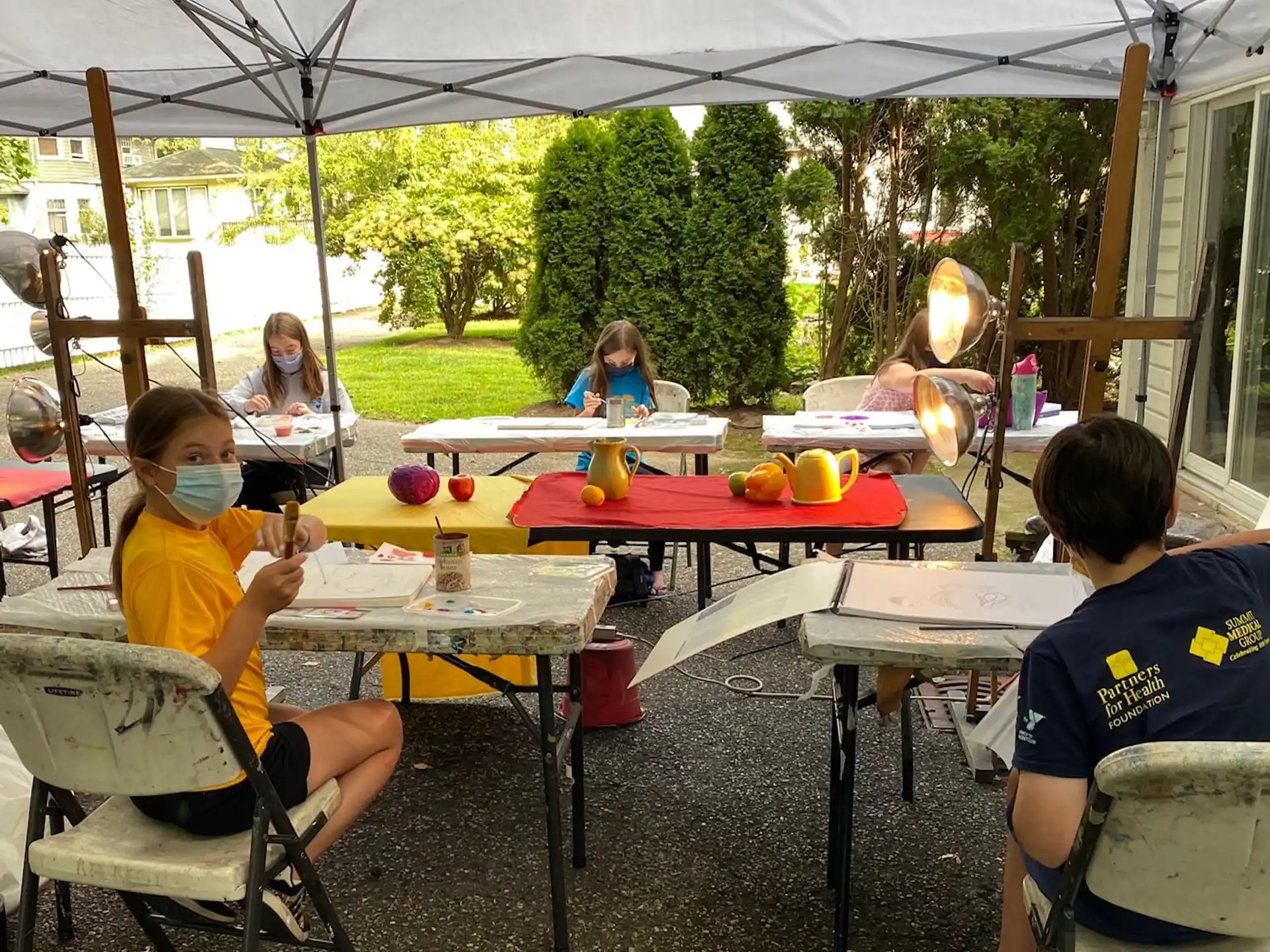 a group of people sitting at tables