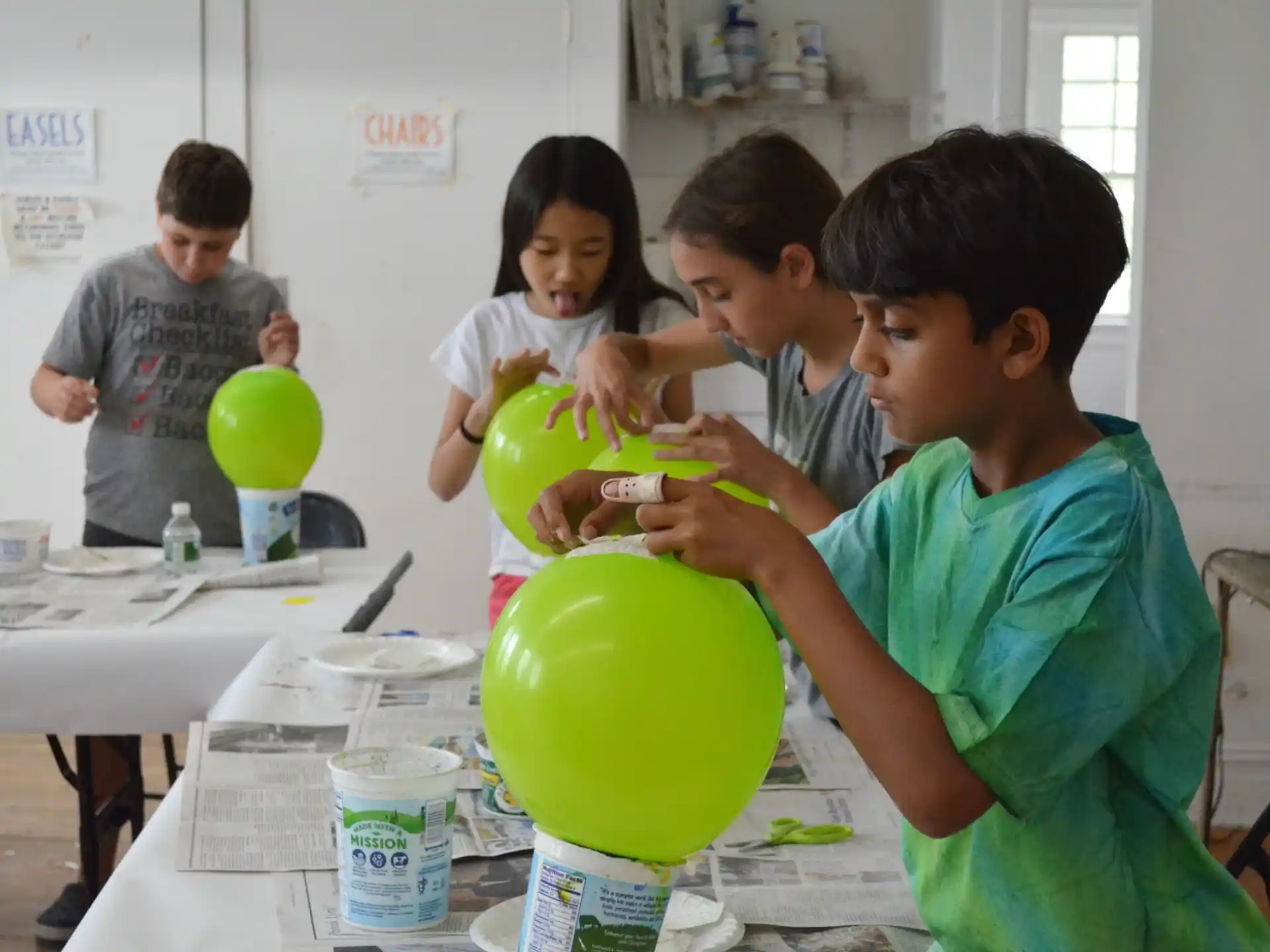 a group of people holding balloons