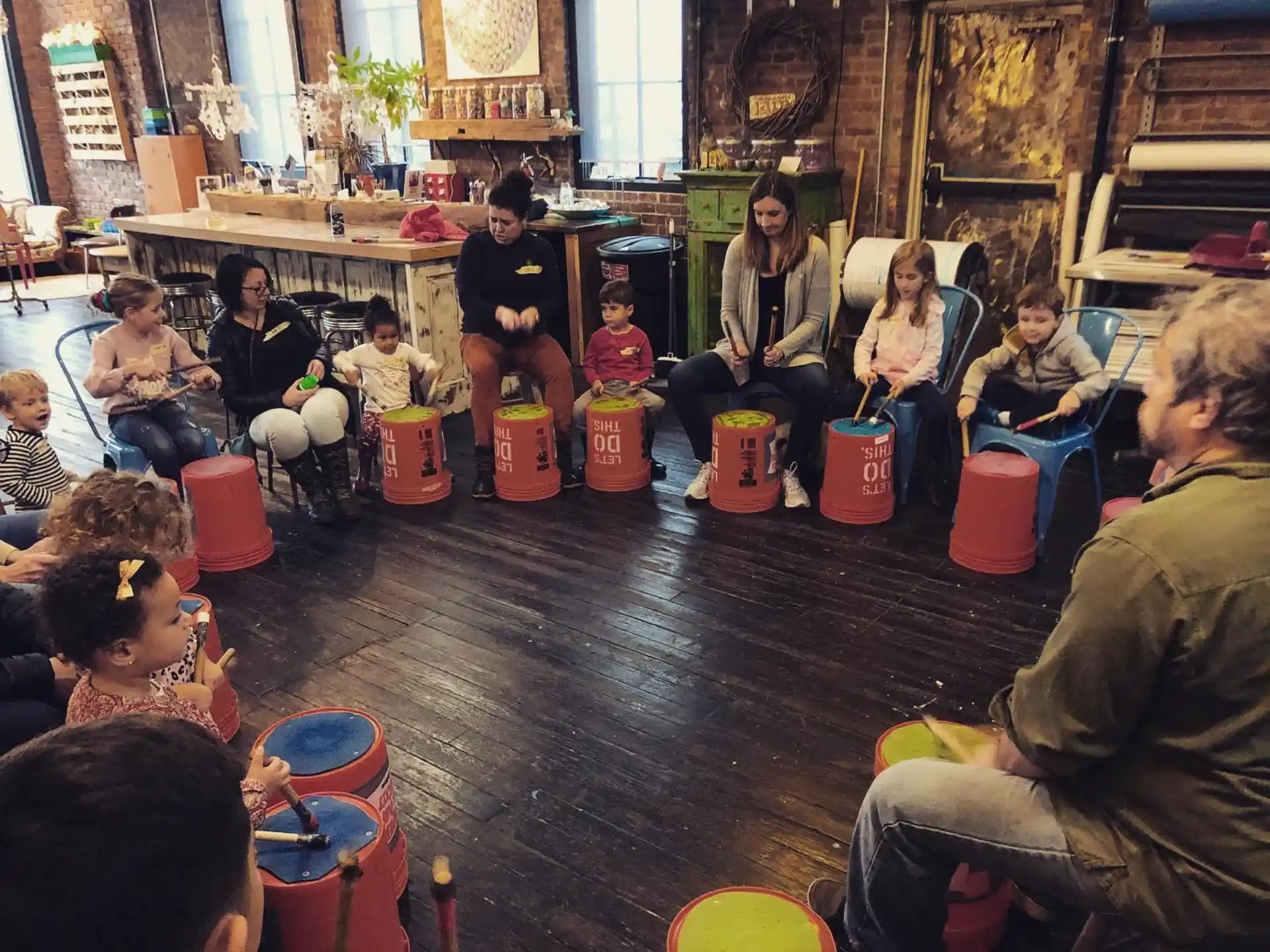 a group of people playing drums