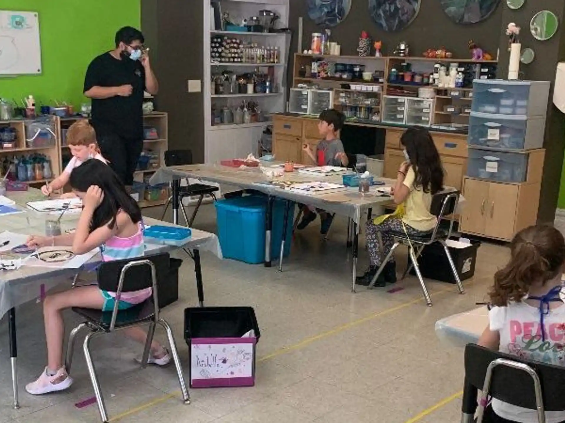 a group of people sitting at tables