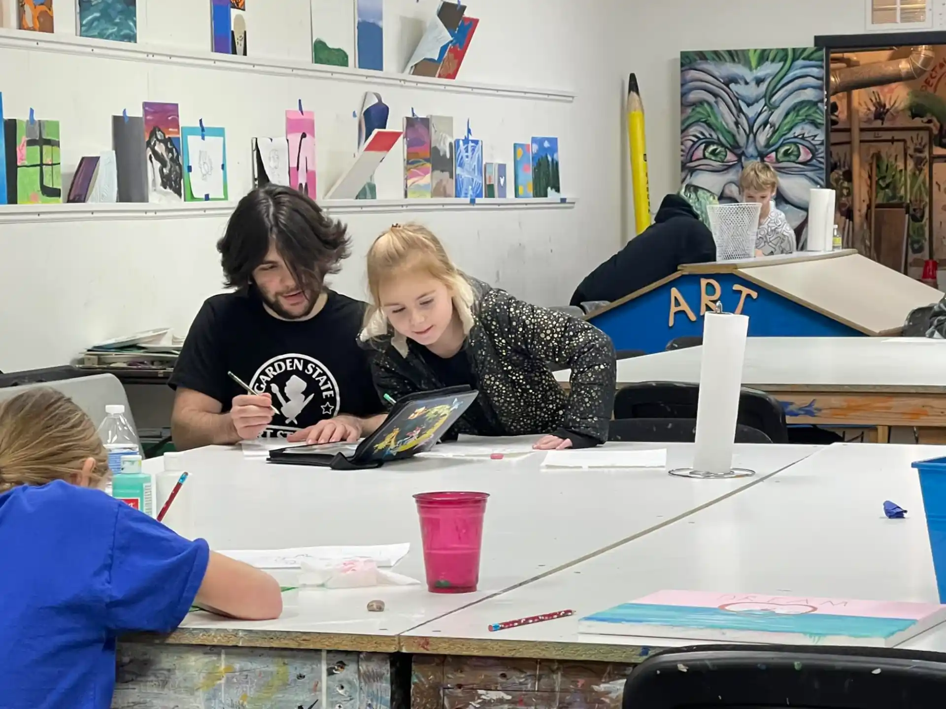 a group of people sitting at a table