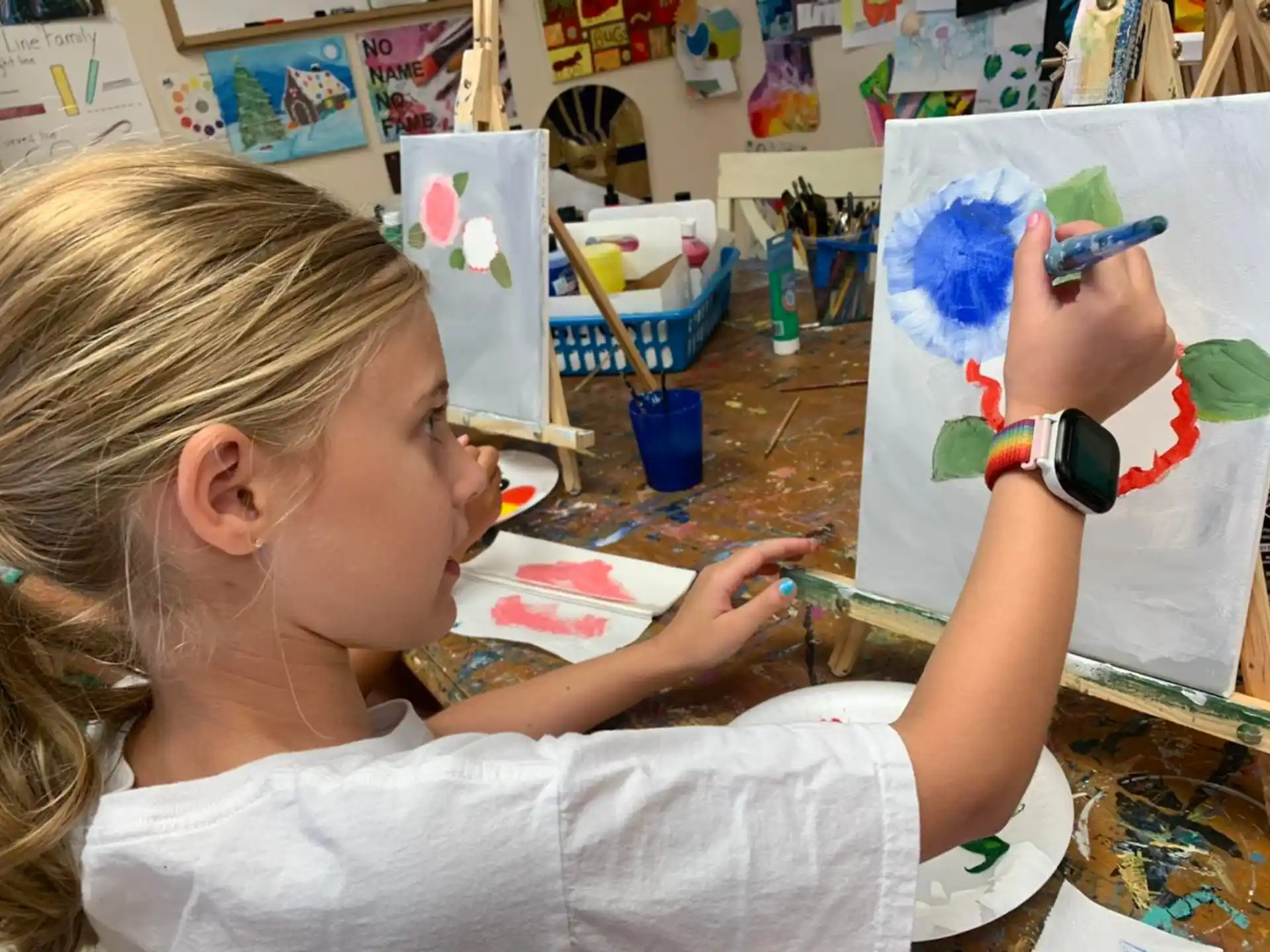 a young girl painting