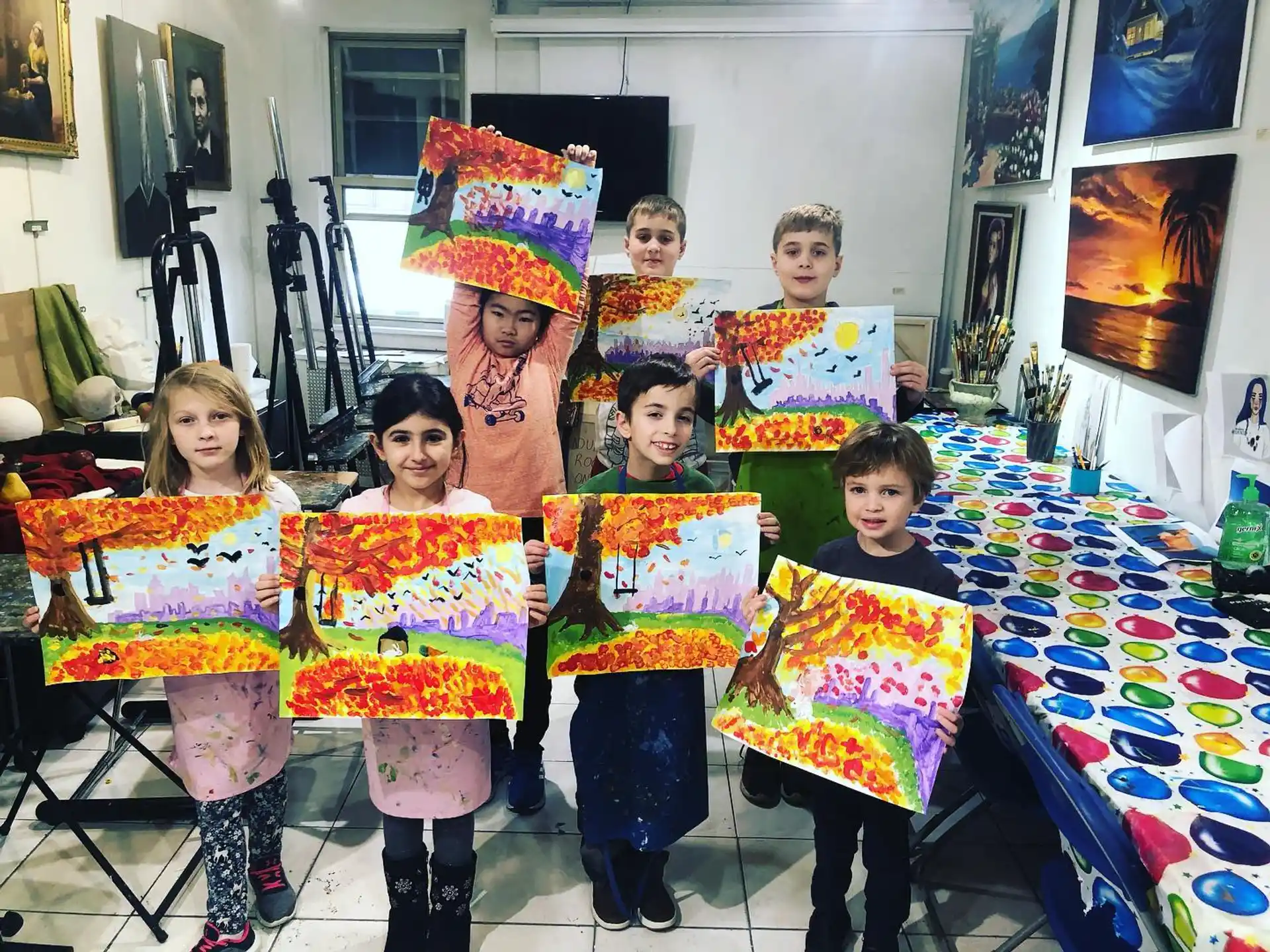 a group of children wearing party hats