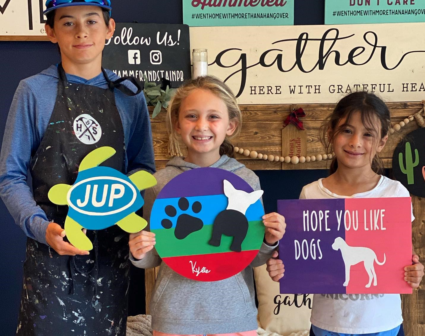 a group of children holding signs