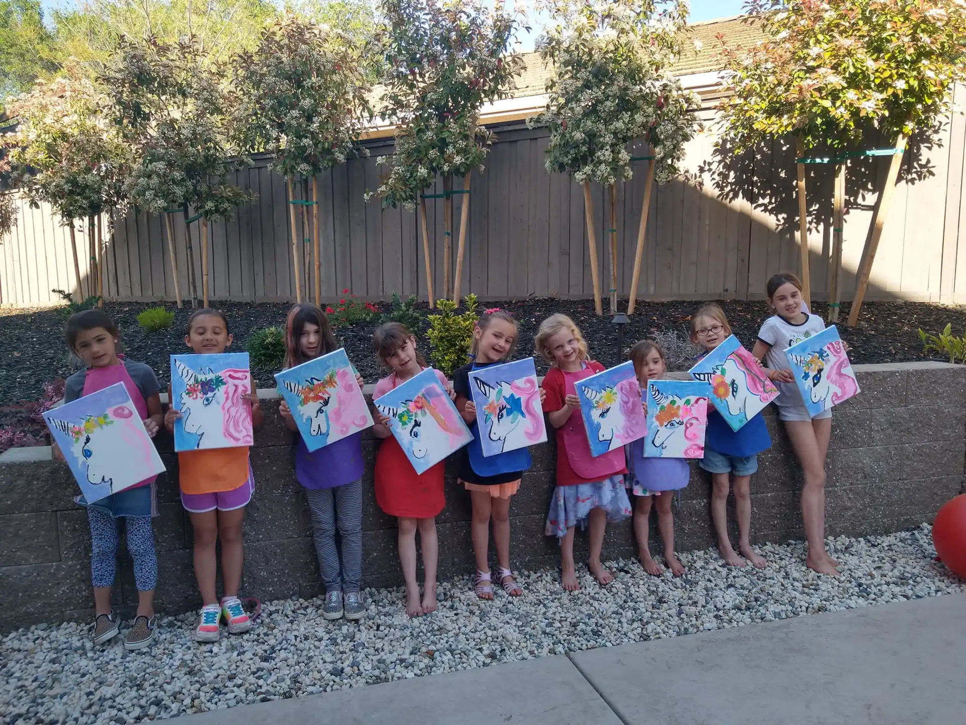 a group of children holding signs
