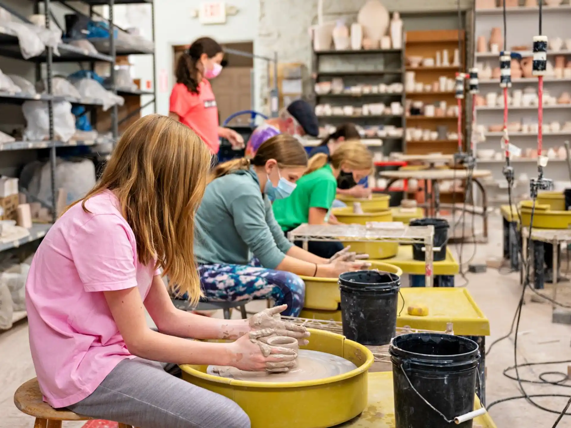 a group of people working in a factory