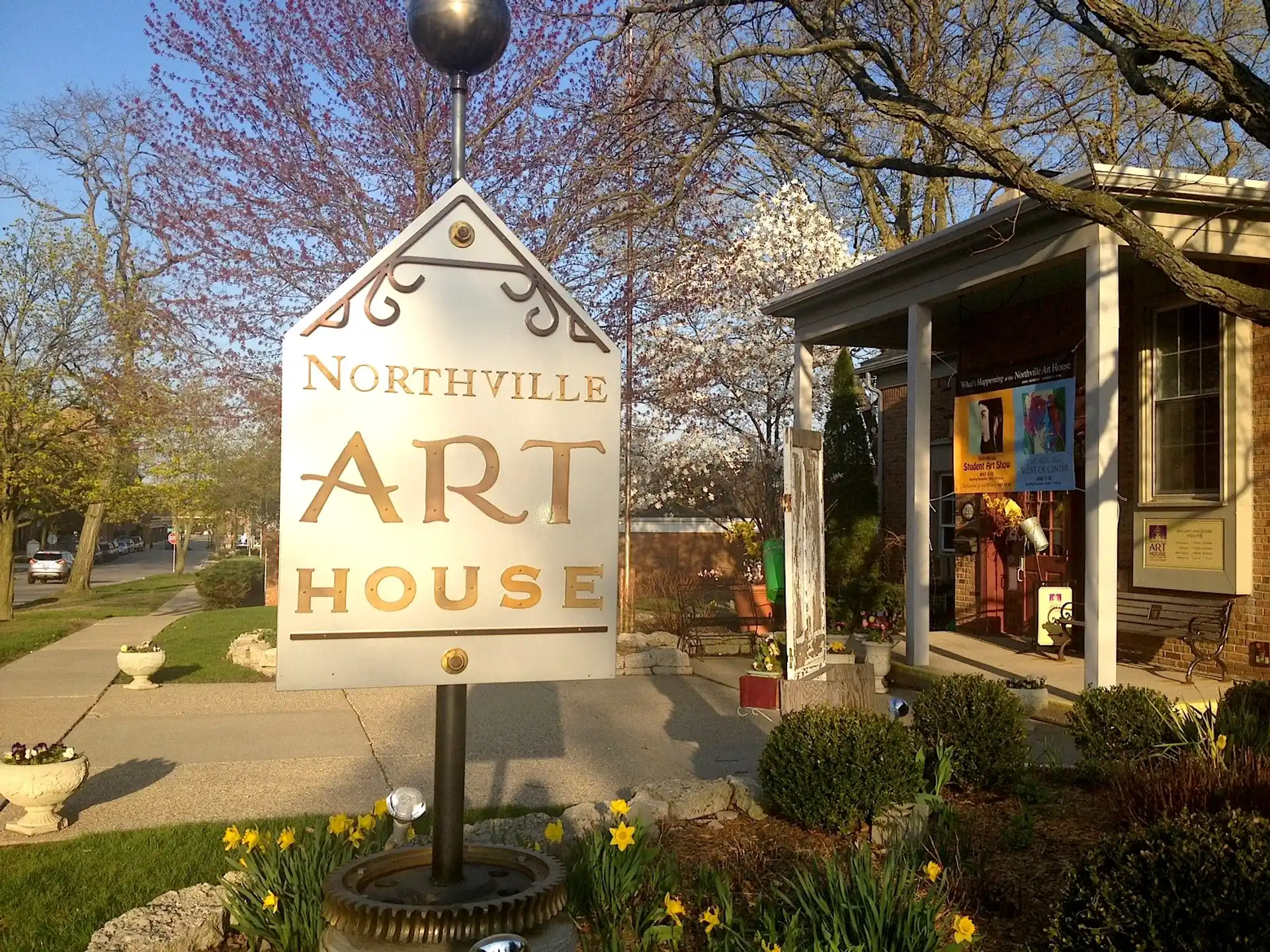 a sign in front of a house