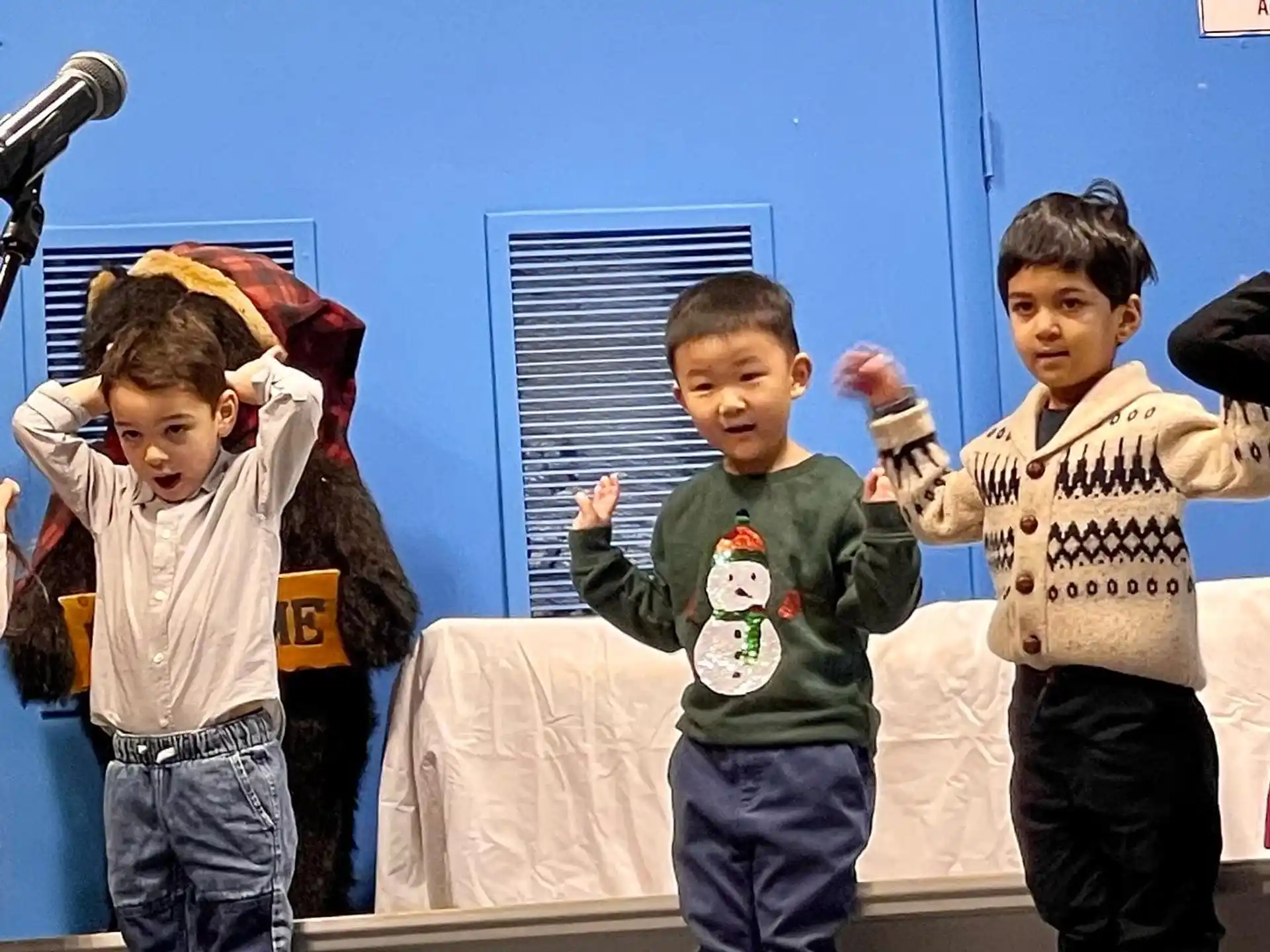 a group of boys posing for a picture
