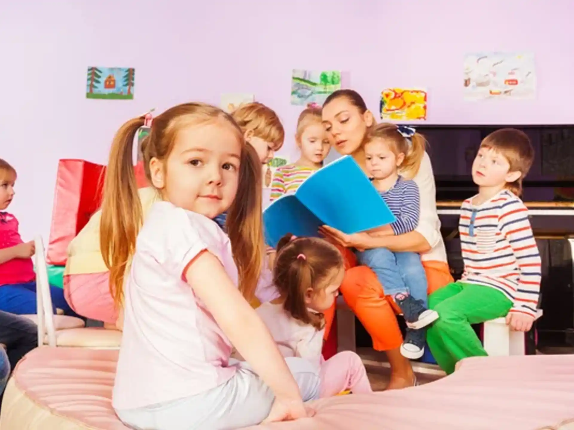 a group of children sitting on a couch