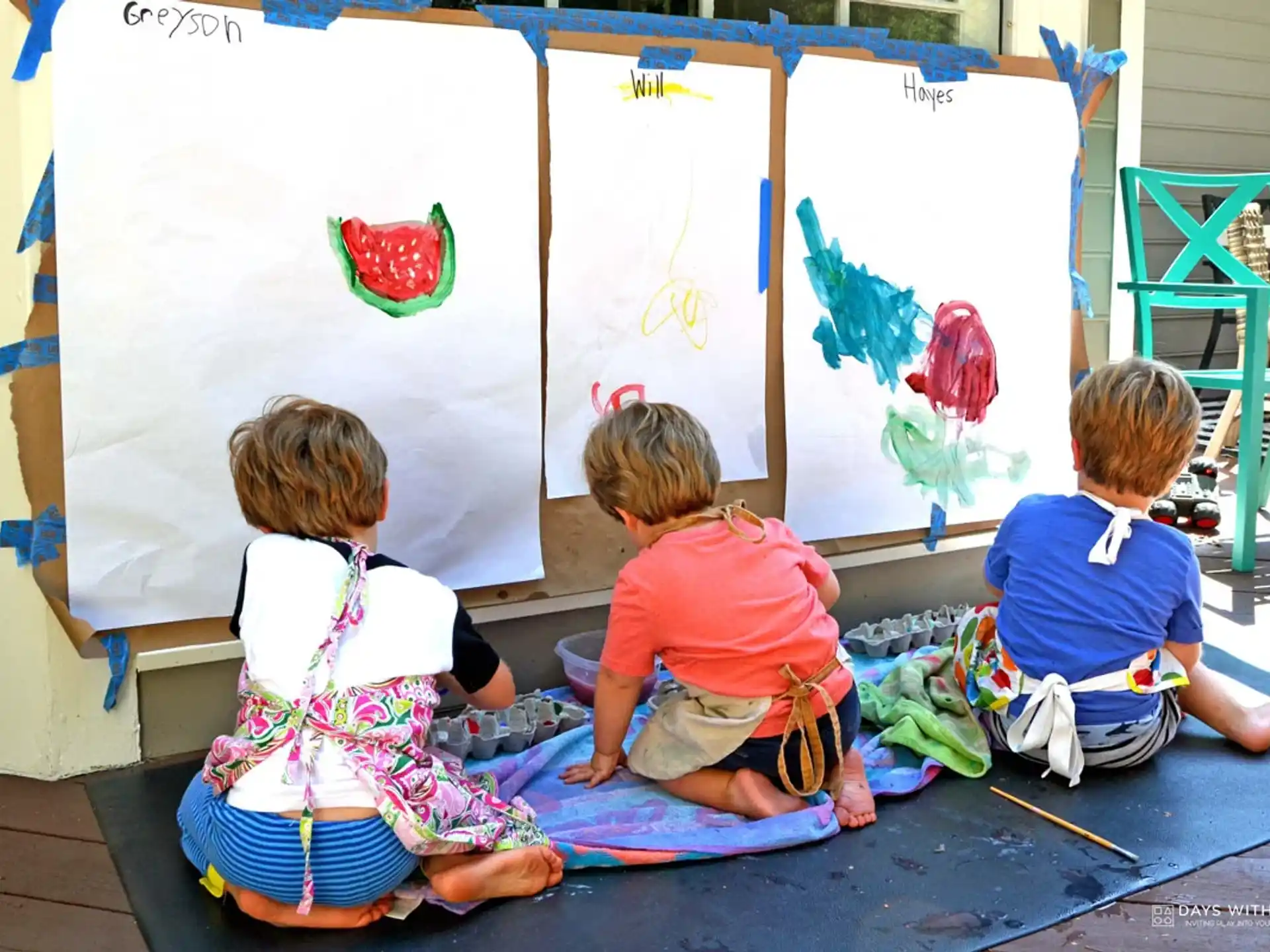 a group of children sitting on the floor