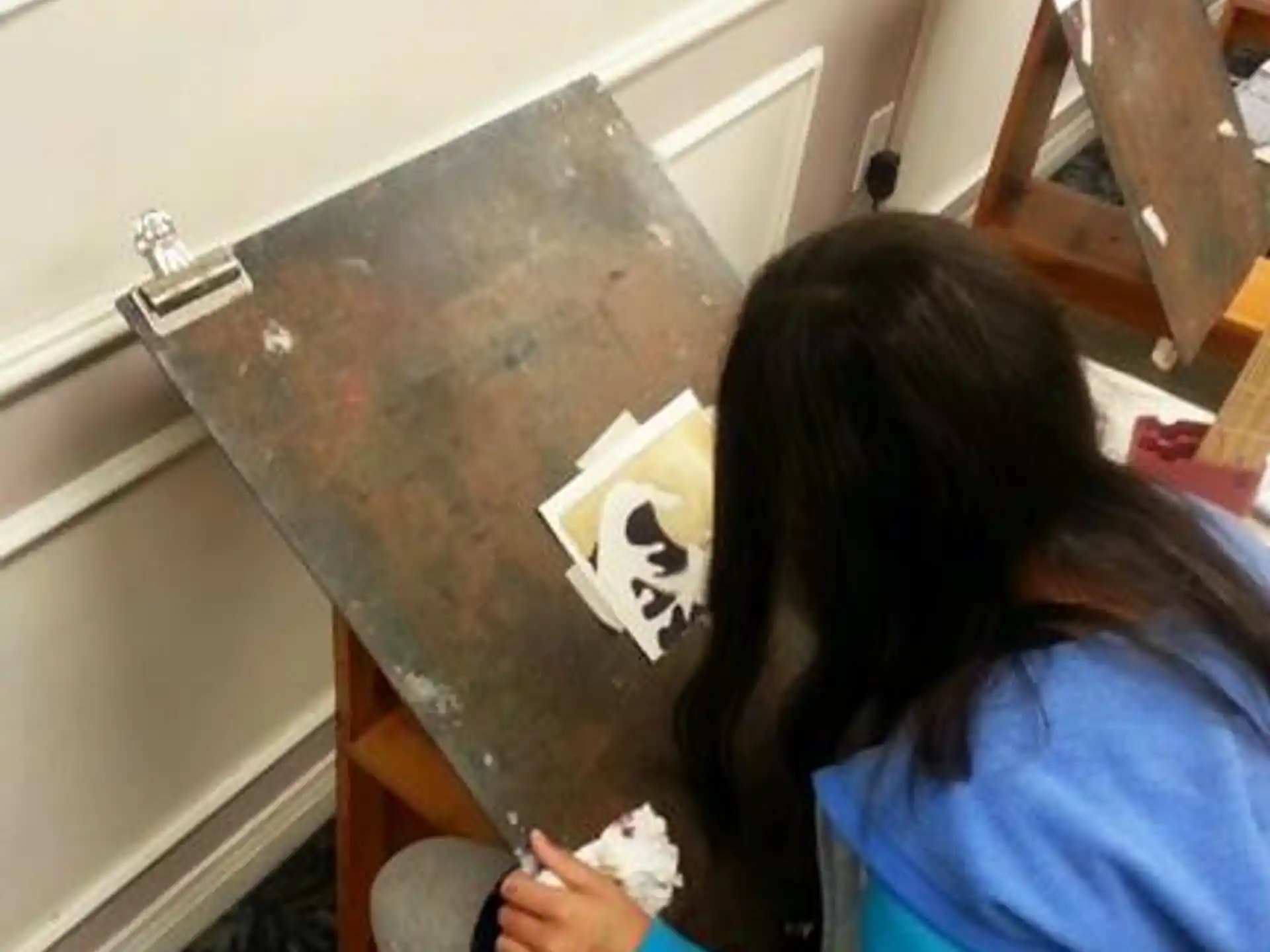 a person sitting at a counter