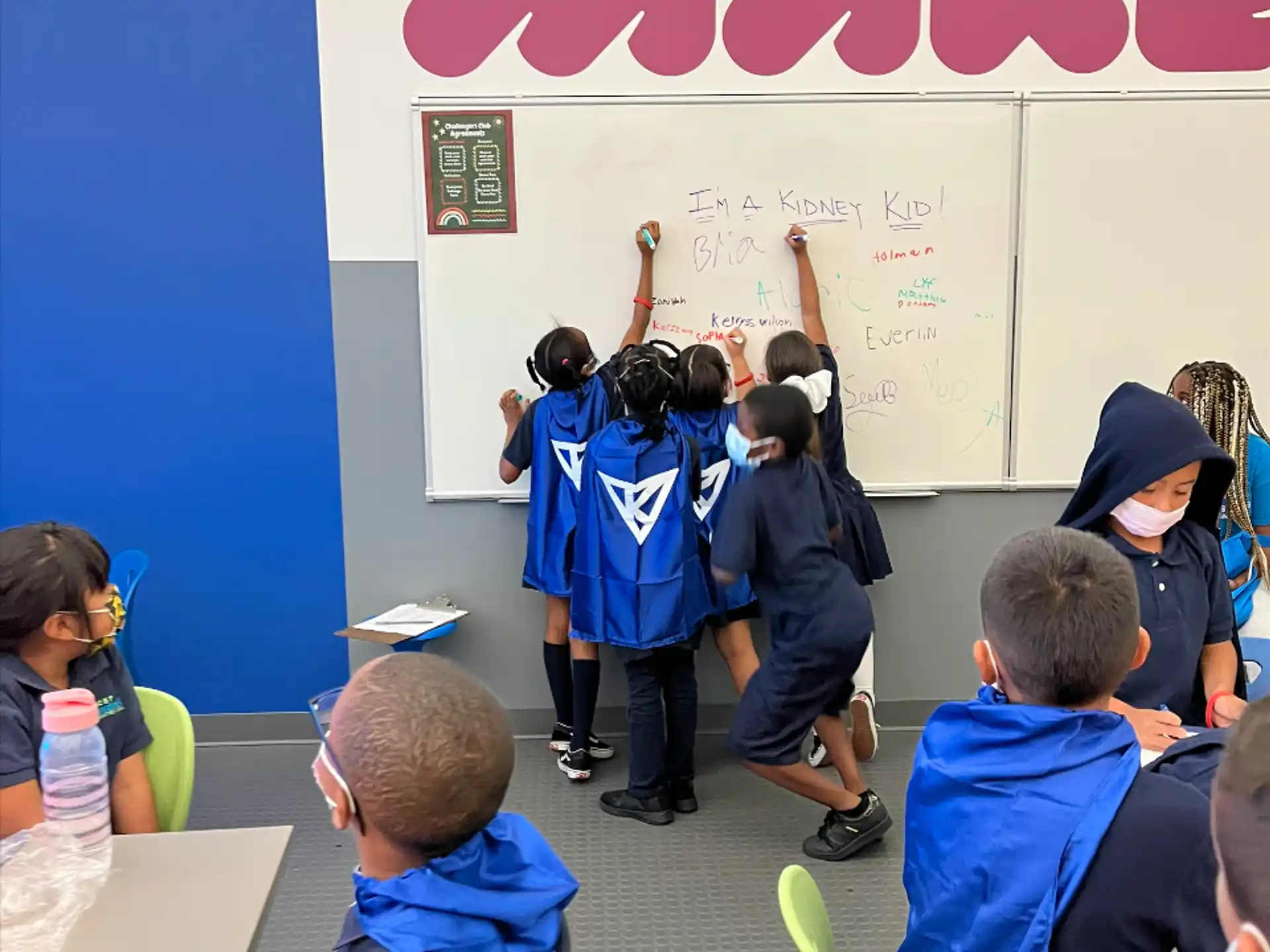 a group of children in a classroom