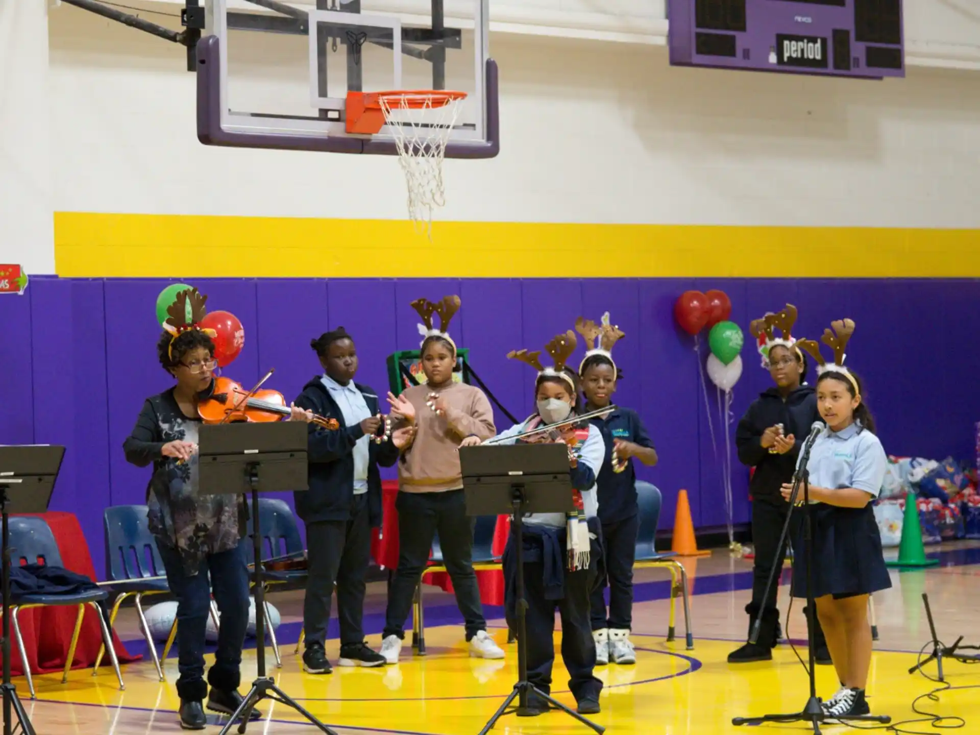 a group of kids in a gym