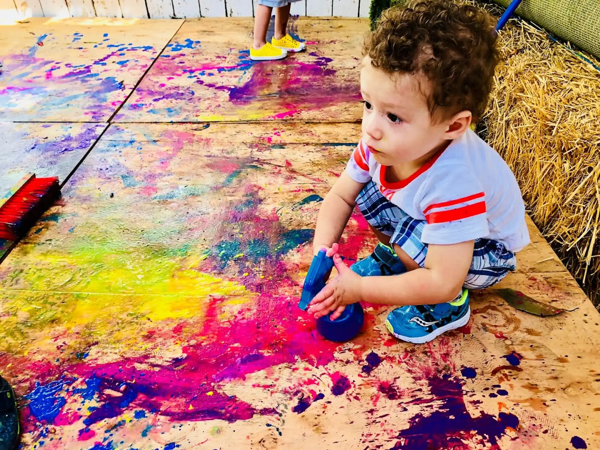 a baby playing with toys