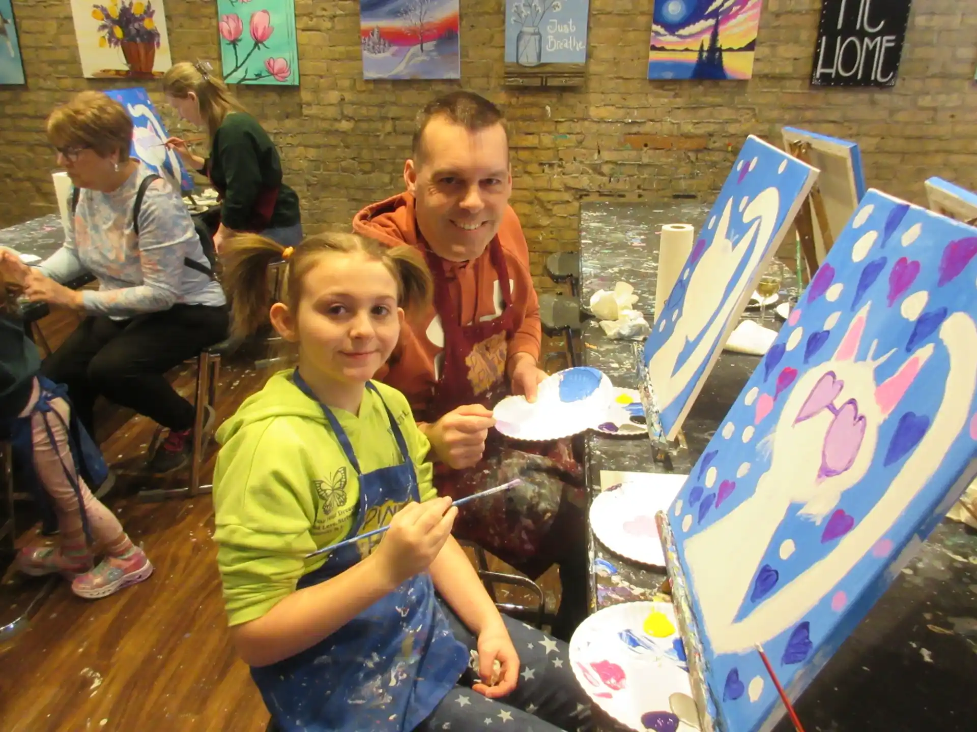 a group of children painting