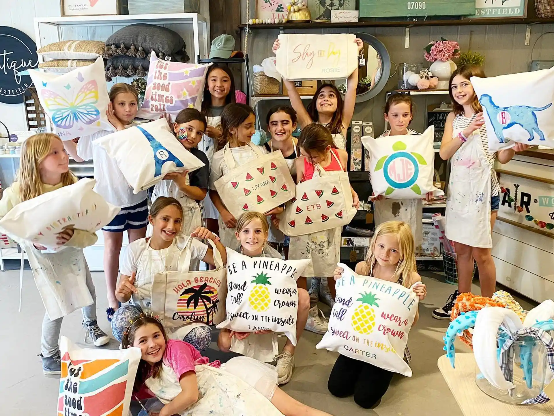 a group of children holding signs