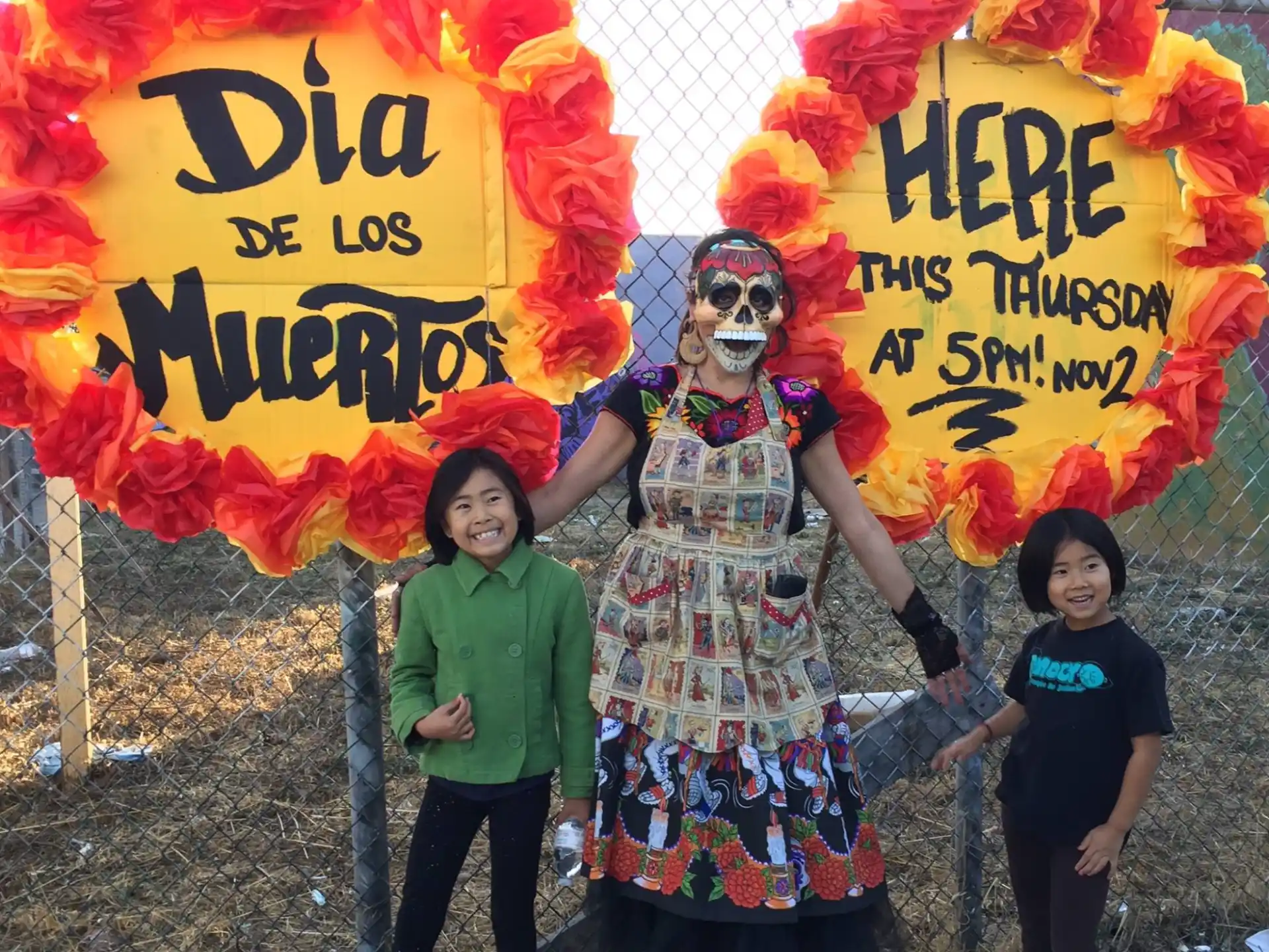 a person and two children posing for a photo