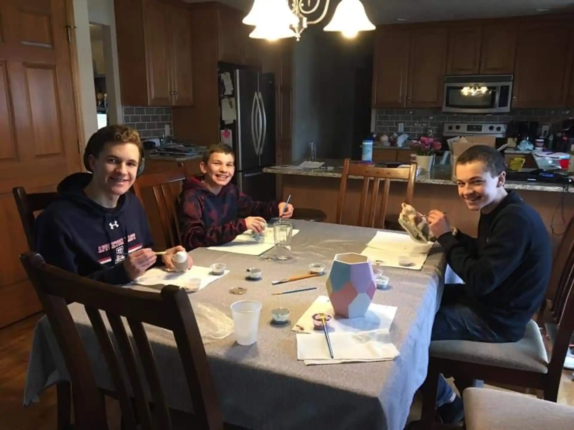 a group of people sitting around a table