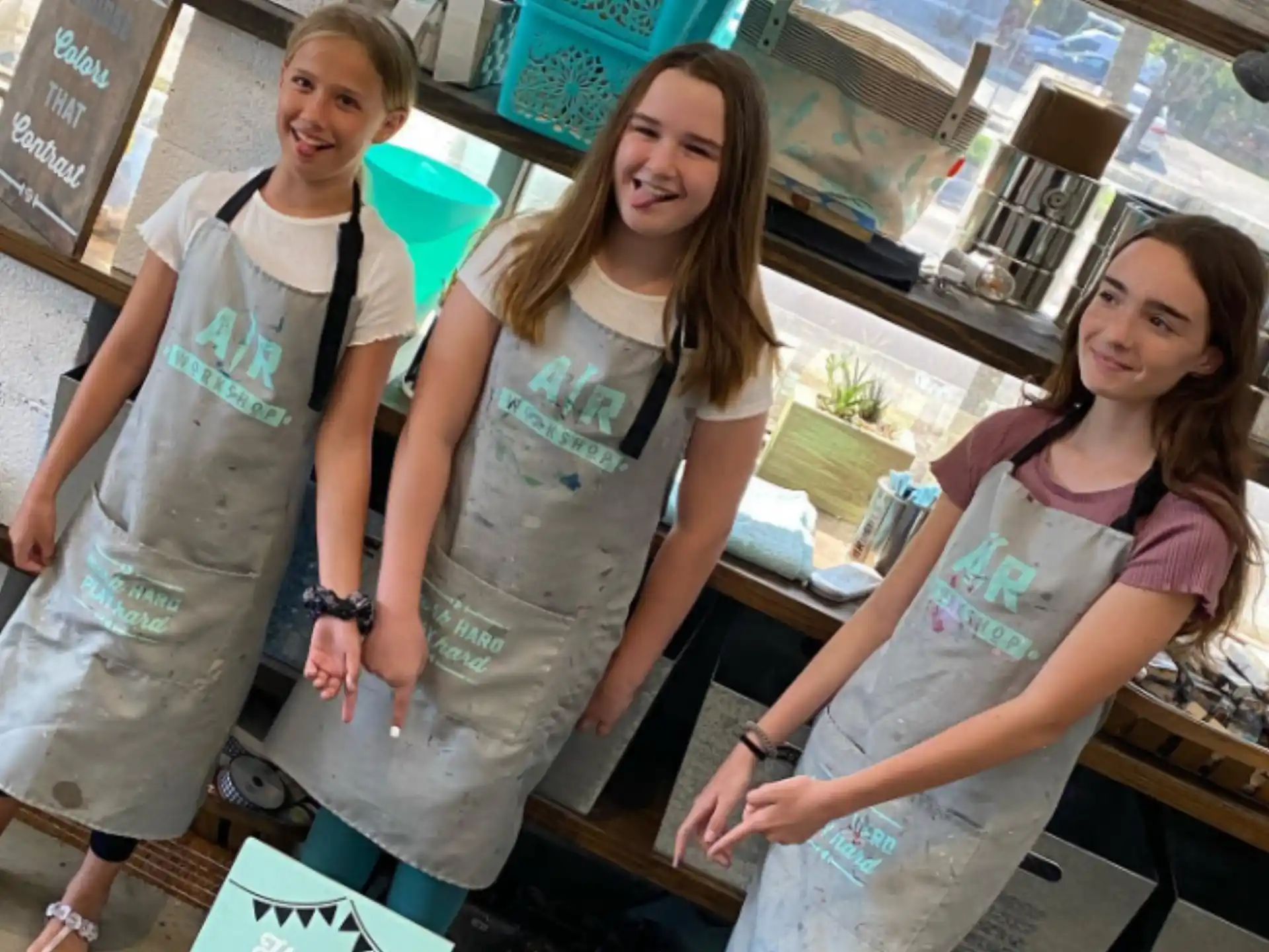 a group of women in aprons
