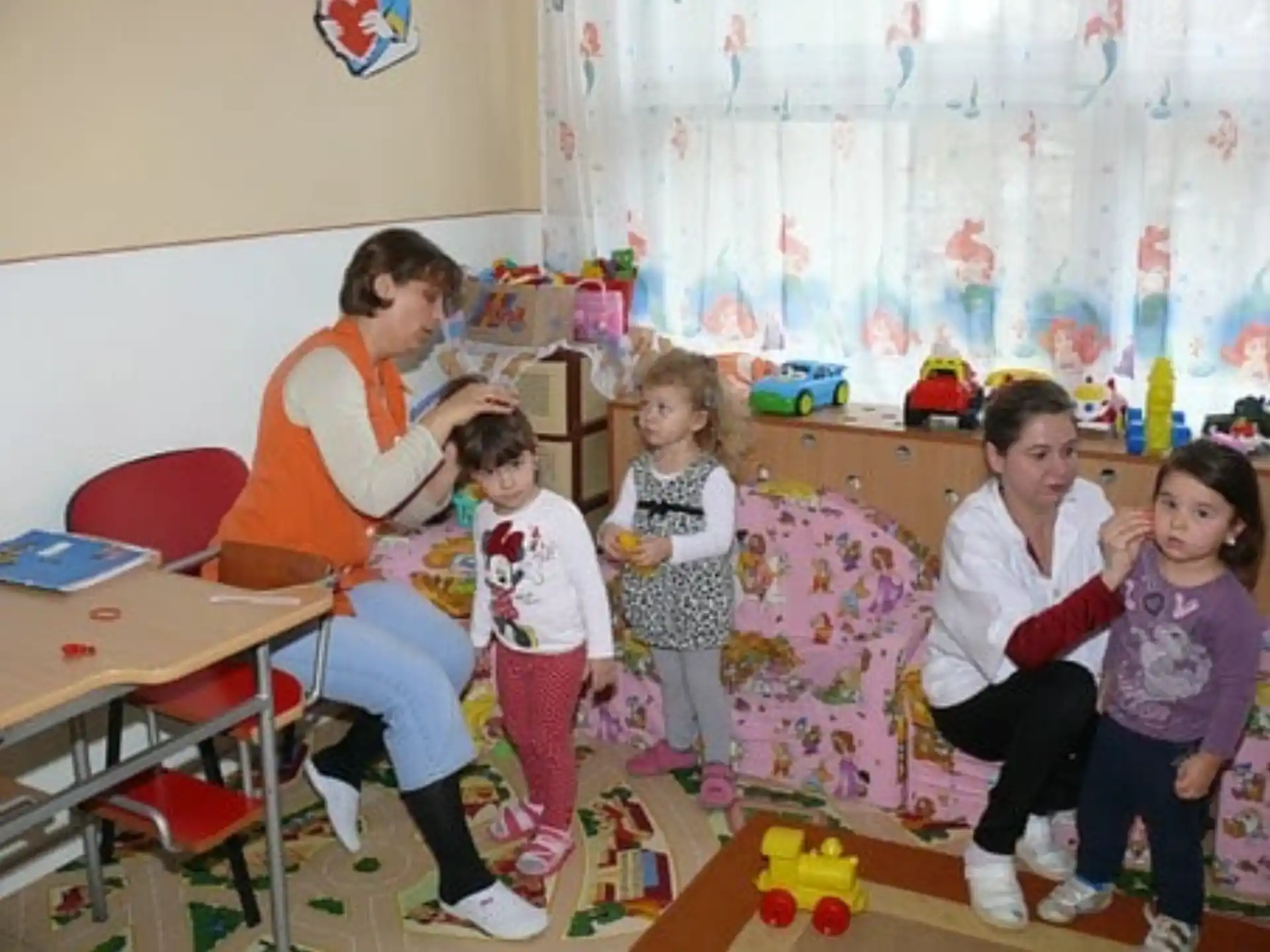 a group of children posing for a photo