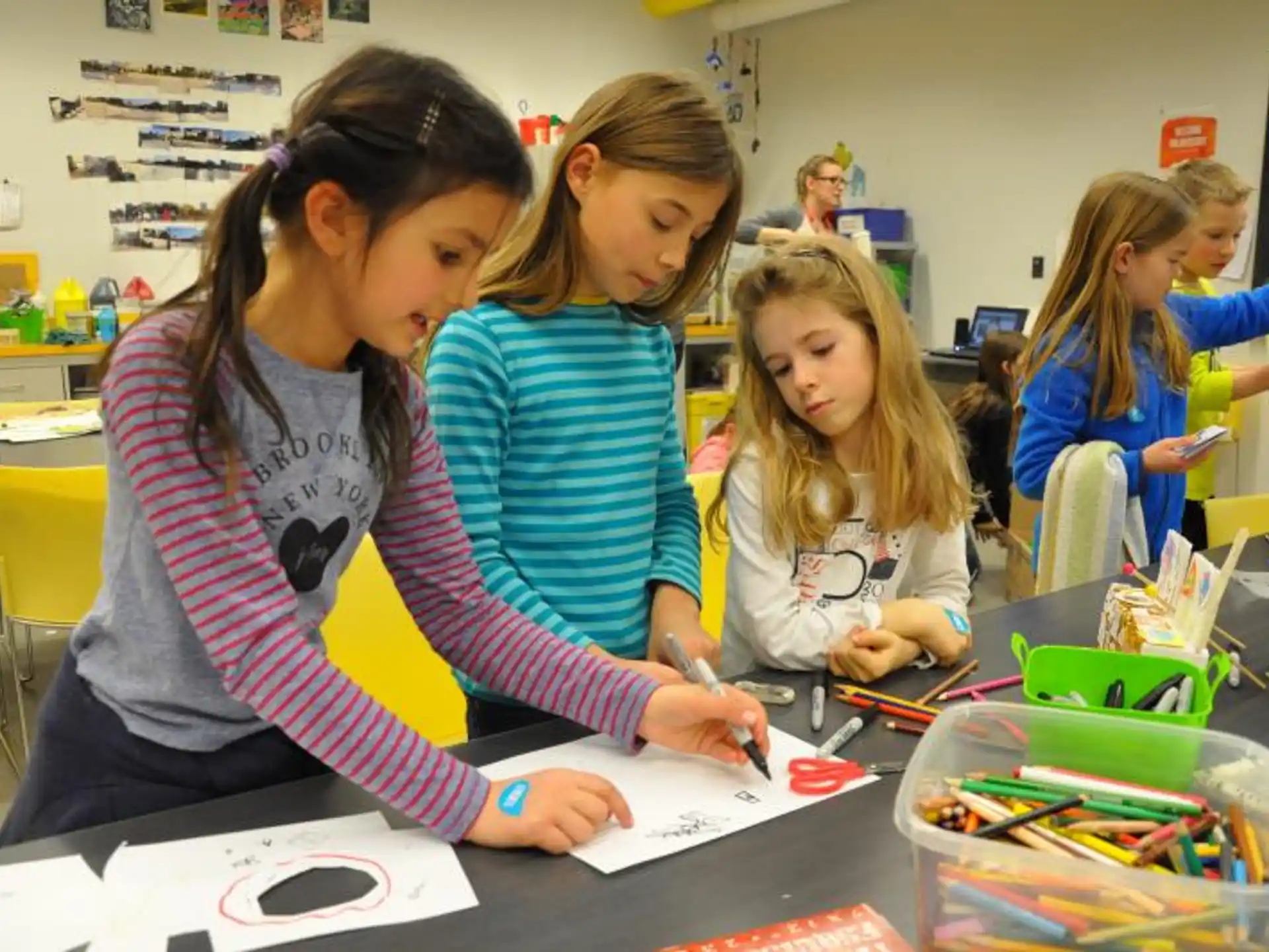 a group of girls in a classroom