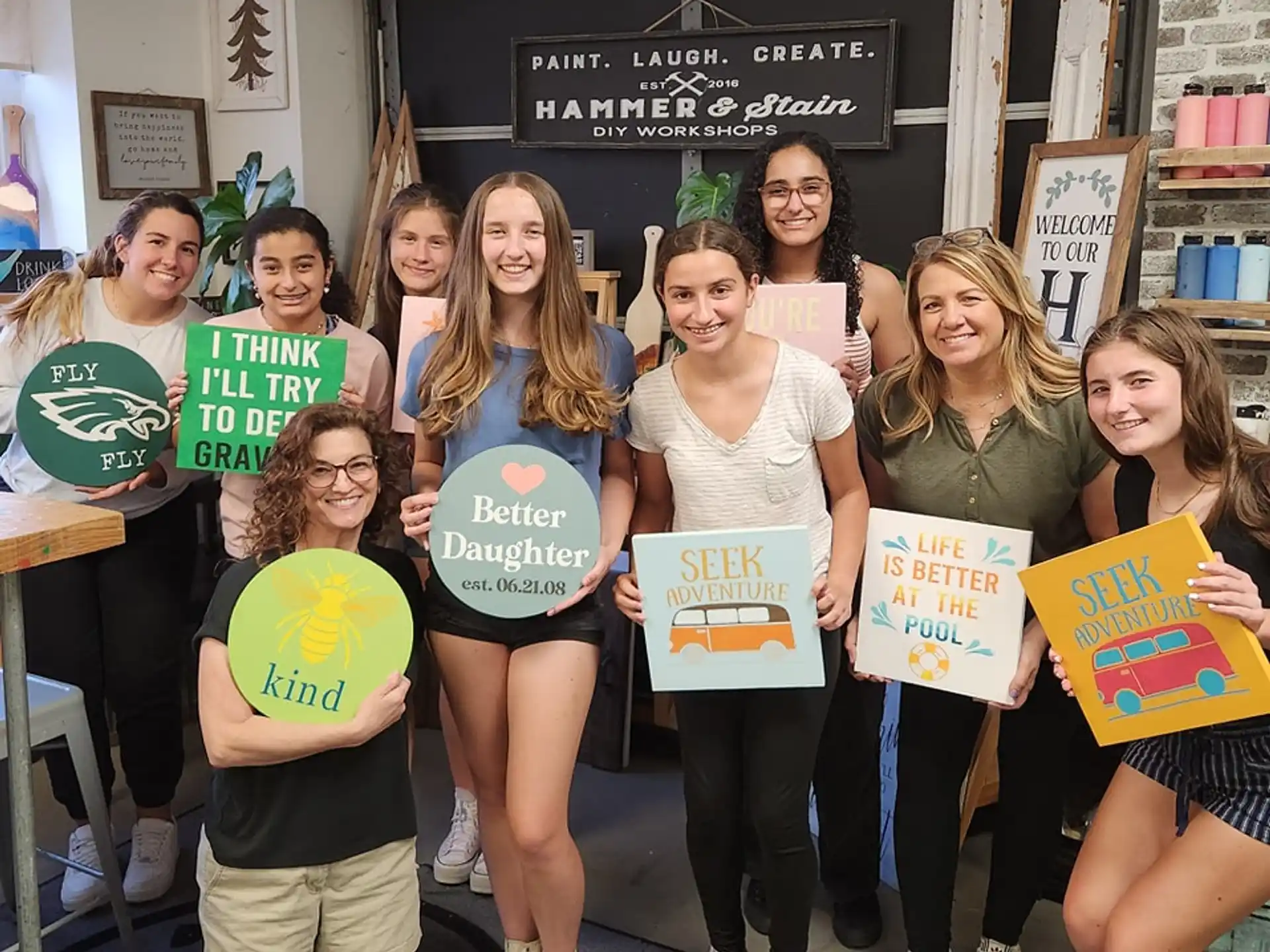 a group of people holding signs