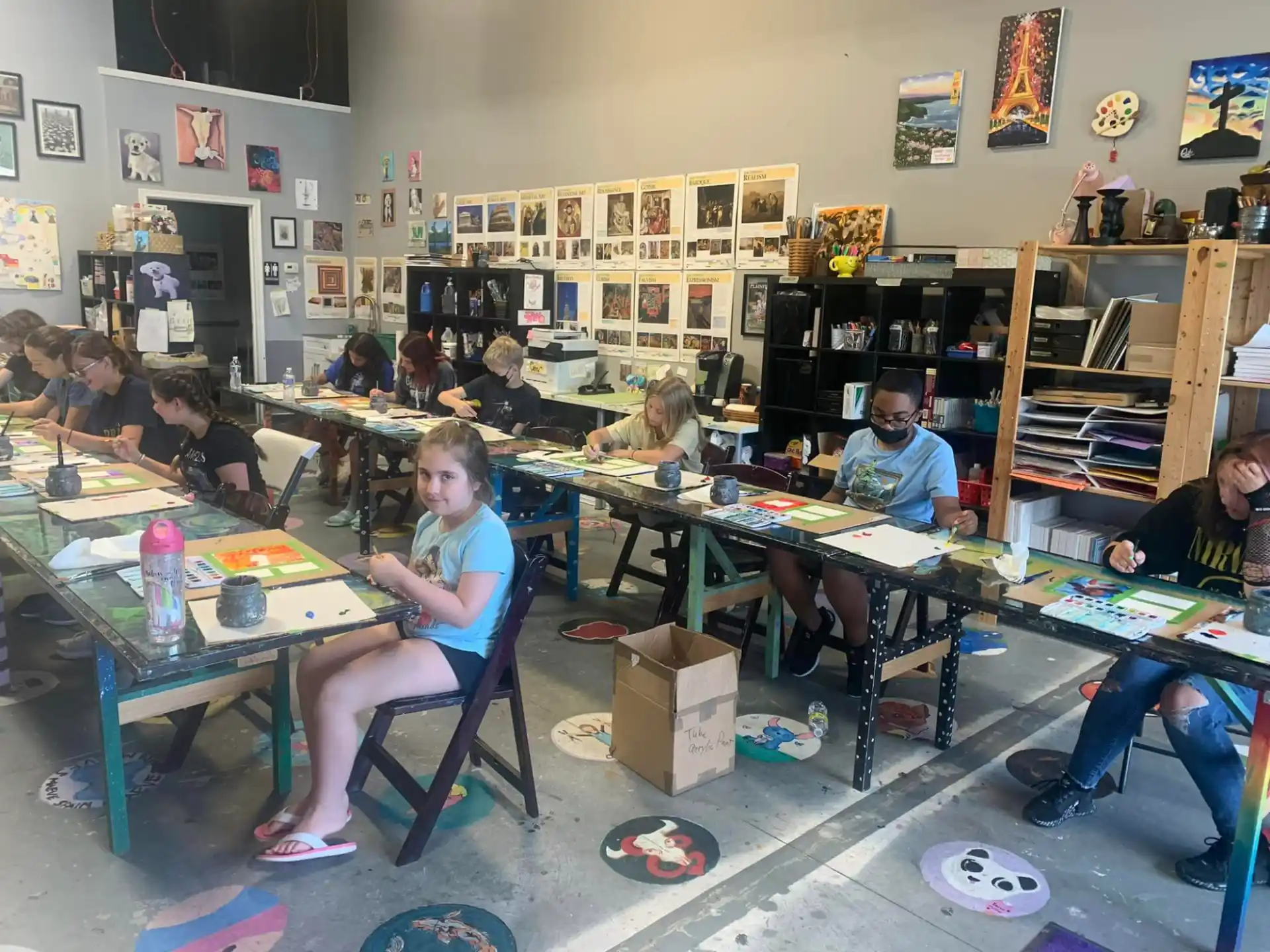 a group of people sitting at tables