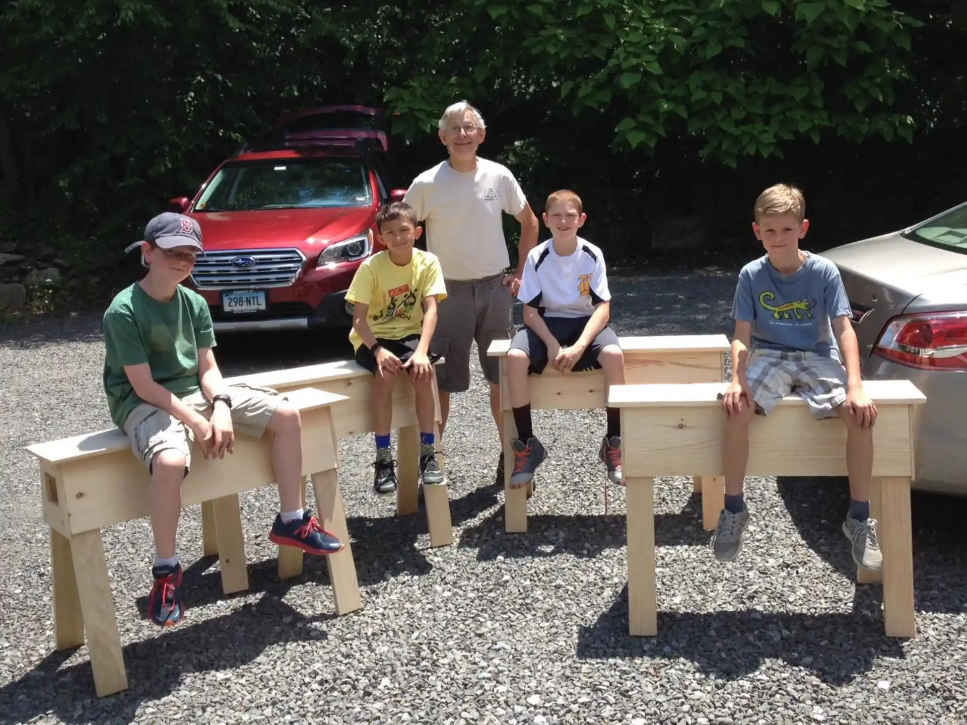 a group of people sitting on a bench