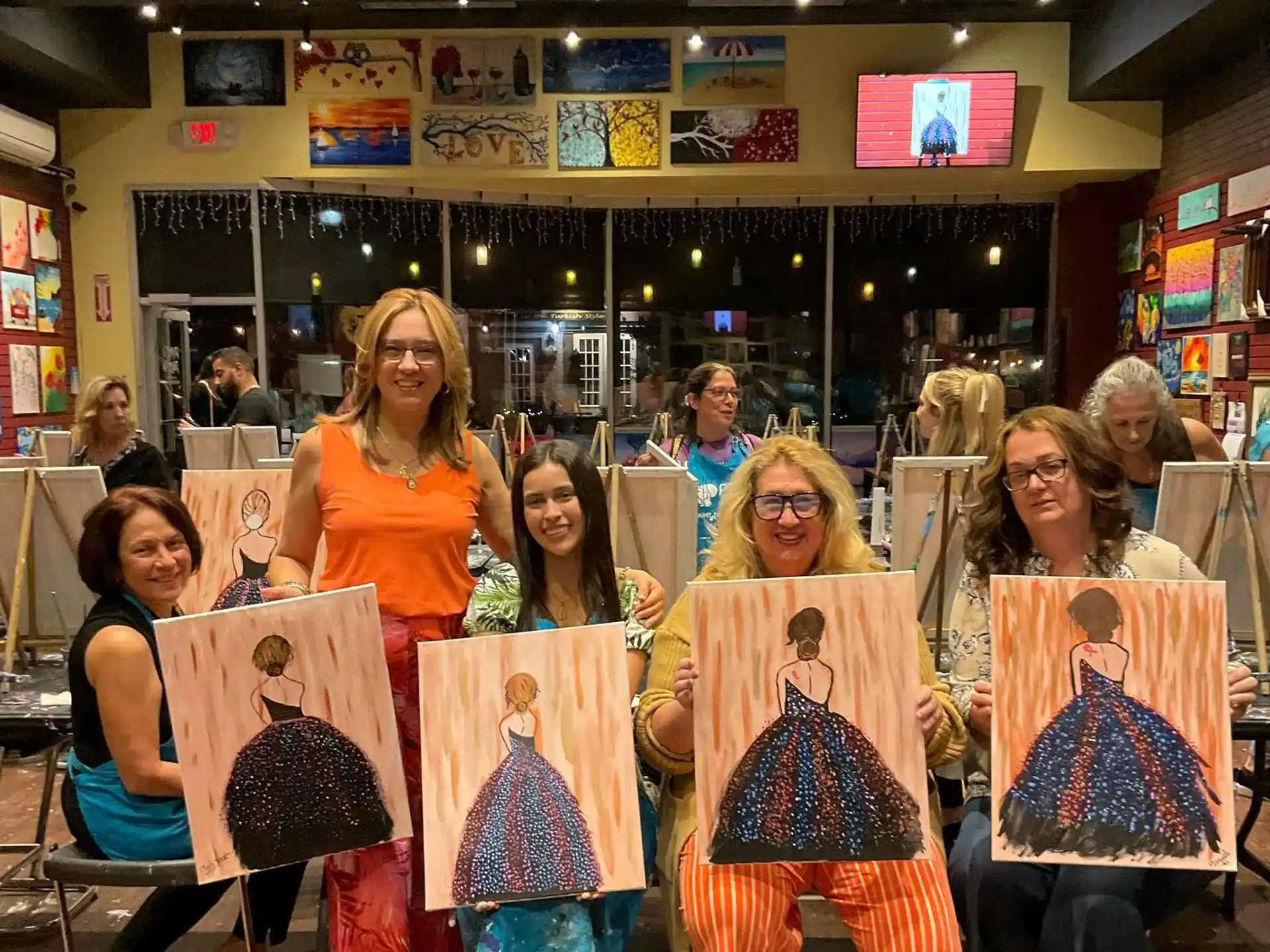 a group of women holding shopping bags