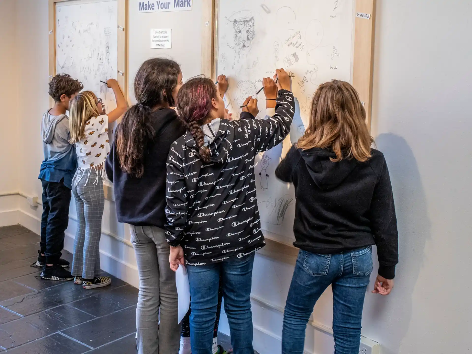 a group of people standing in a room