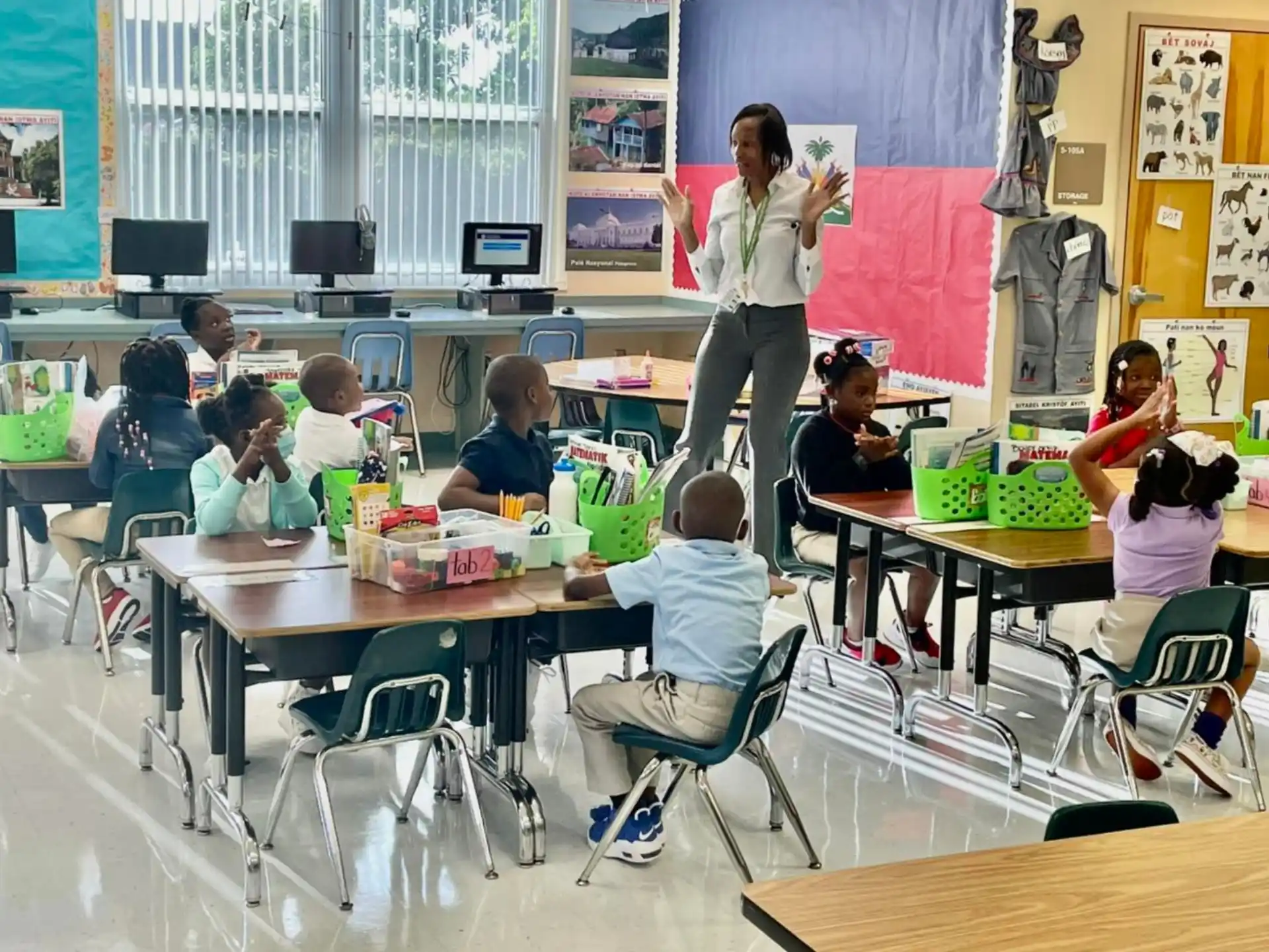 a person teaching children in a classroom