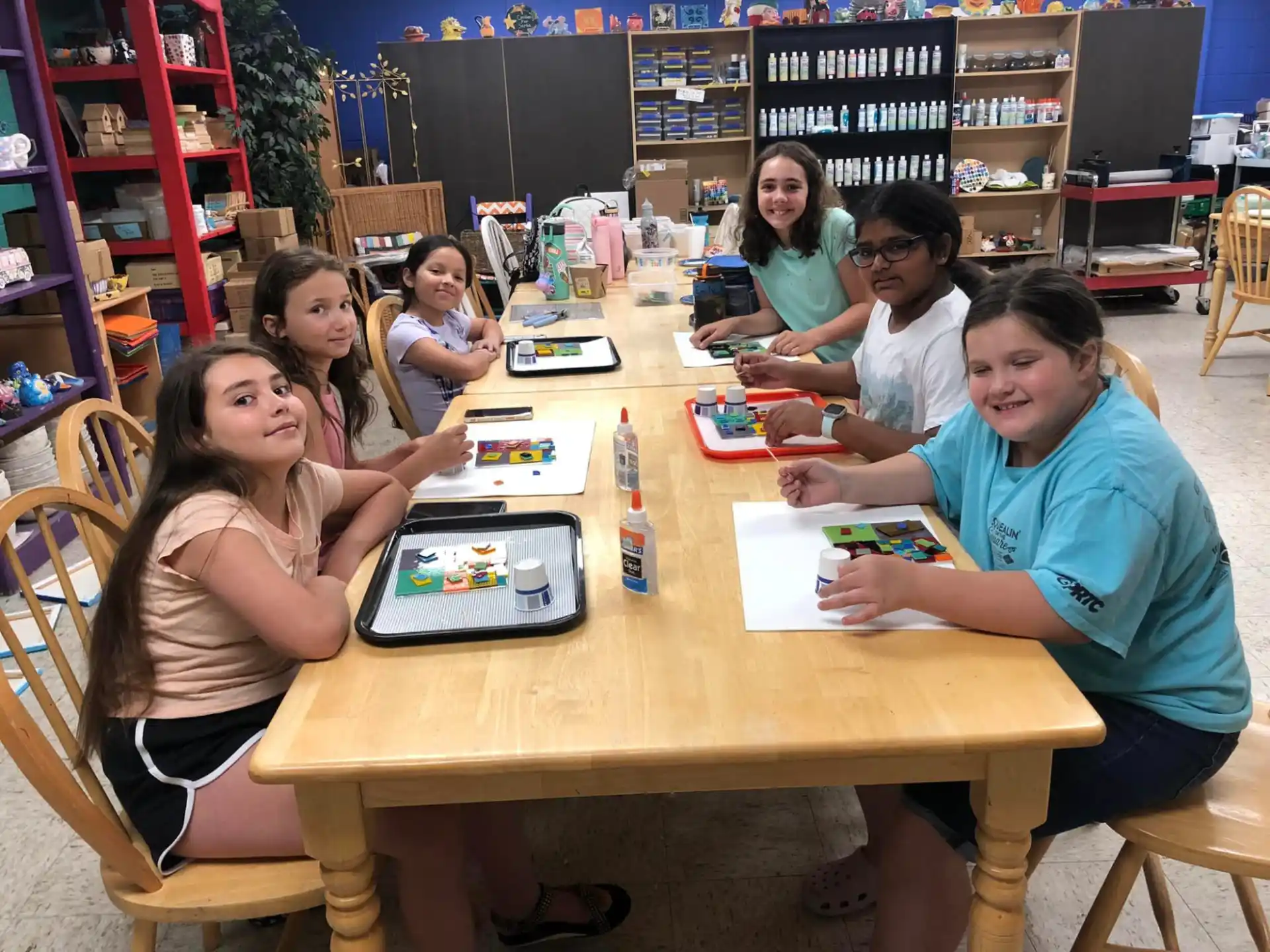 a group of people sitting around a table