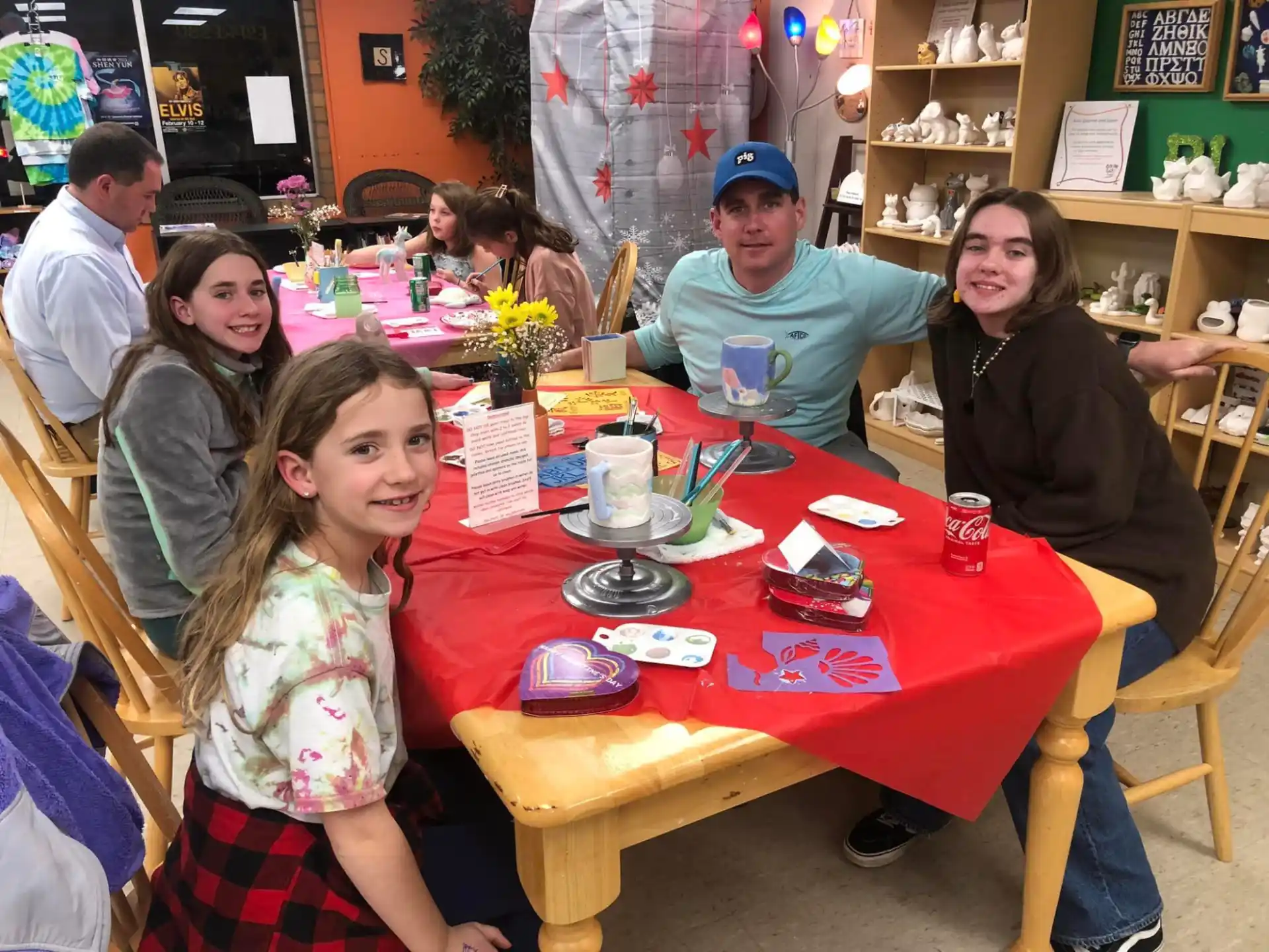 a group of people sitting at a table