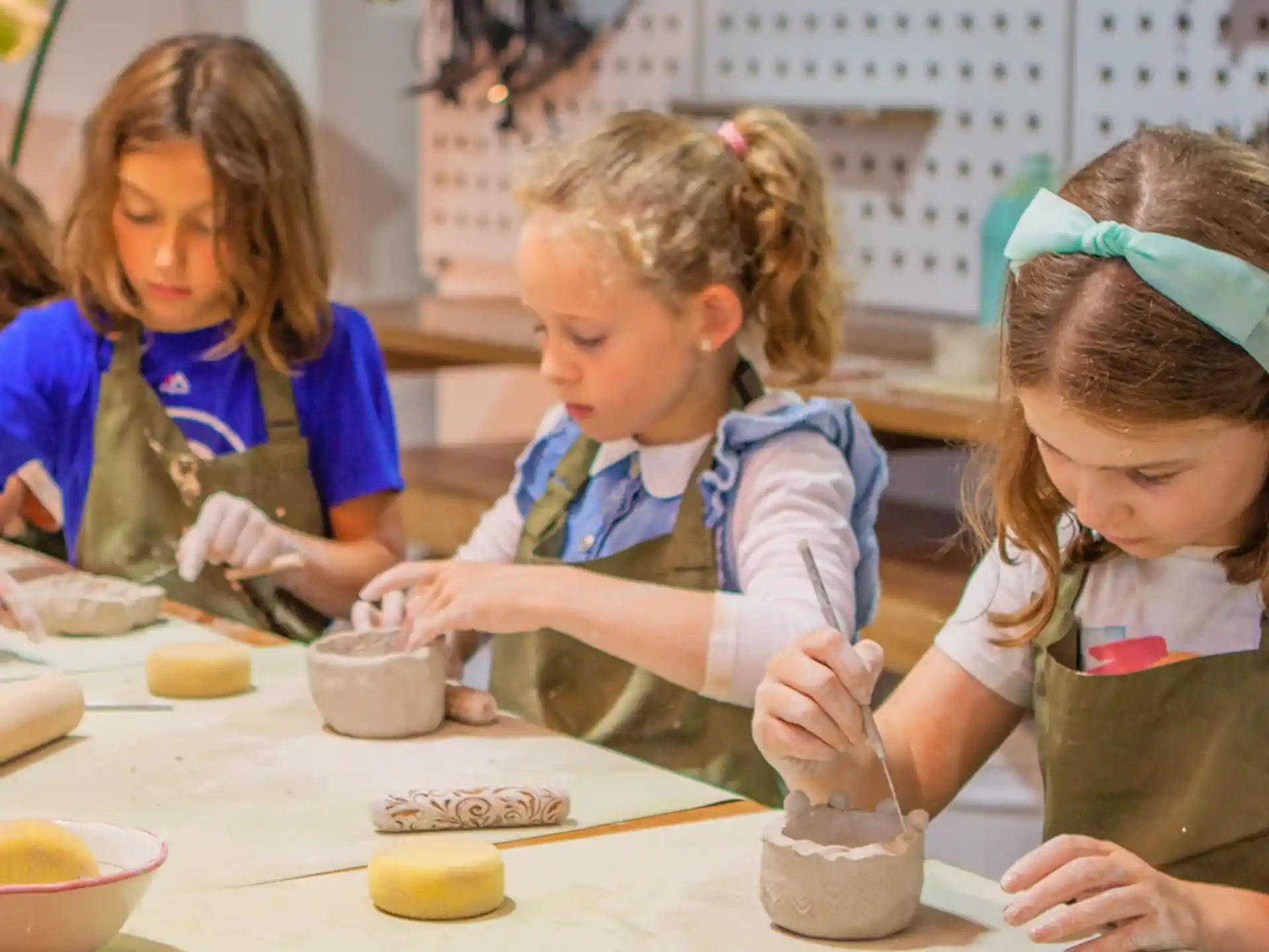 a group of children painting