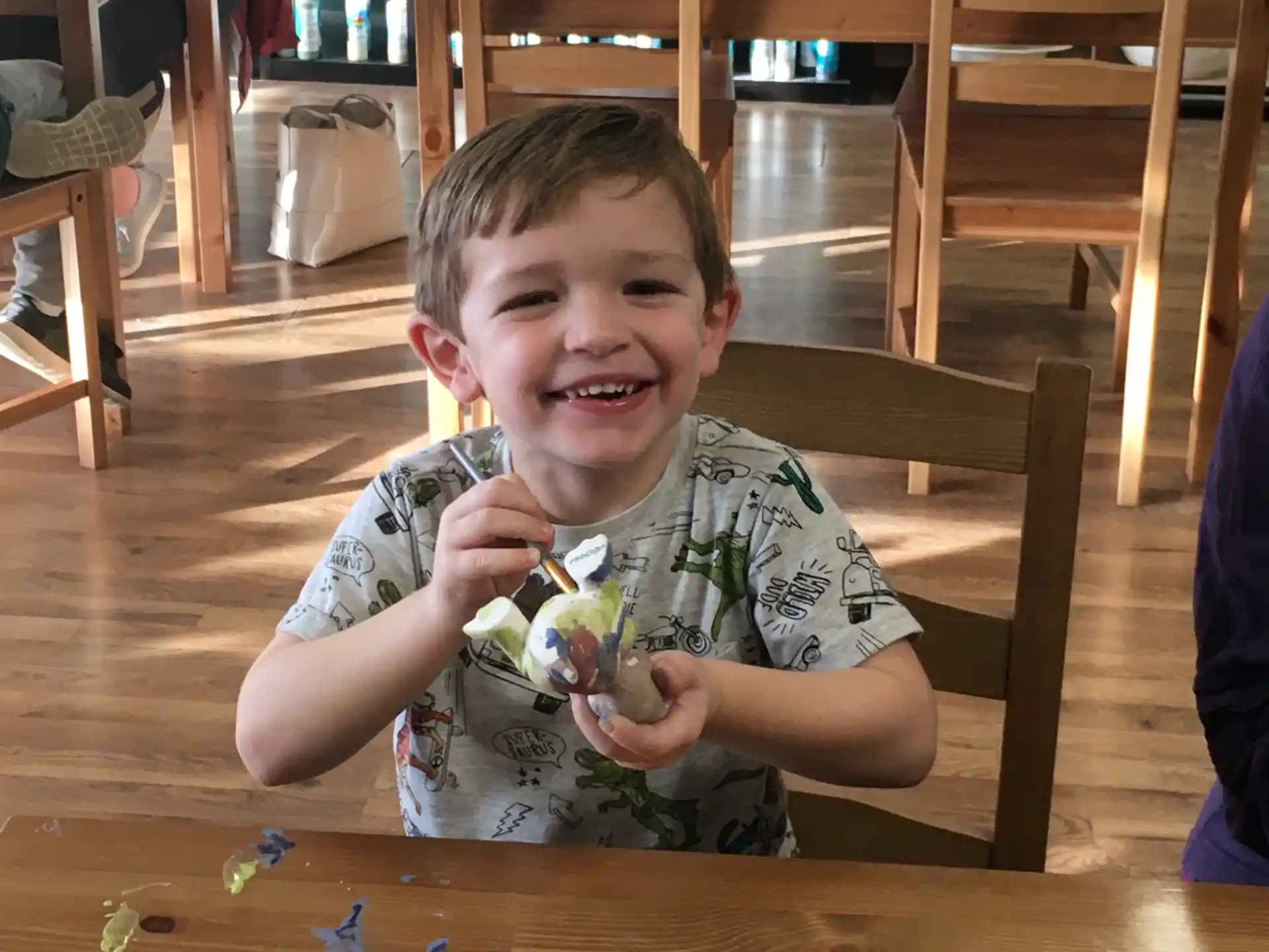 a boy sitting at a table