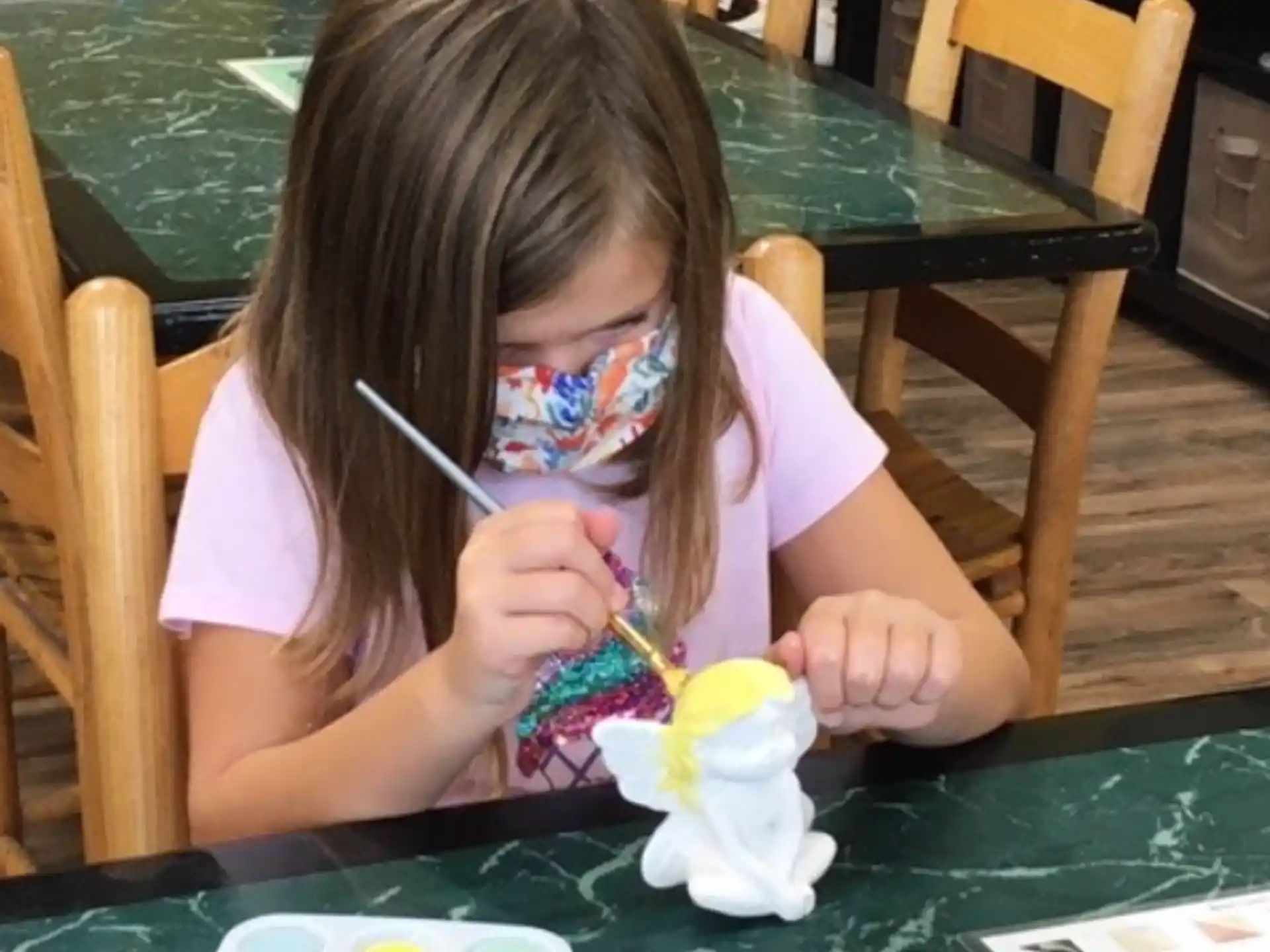 a girl eating a flower