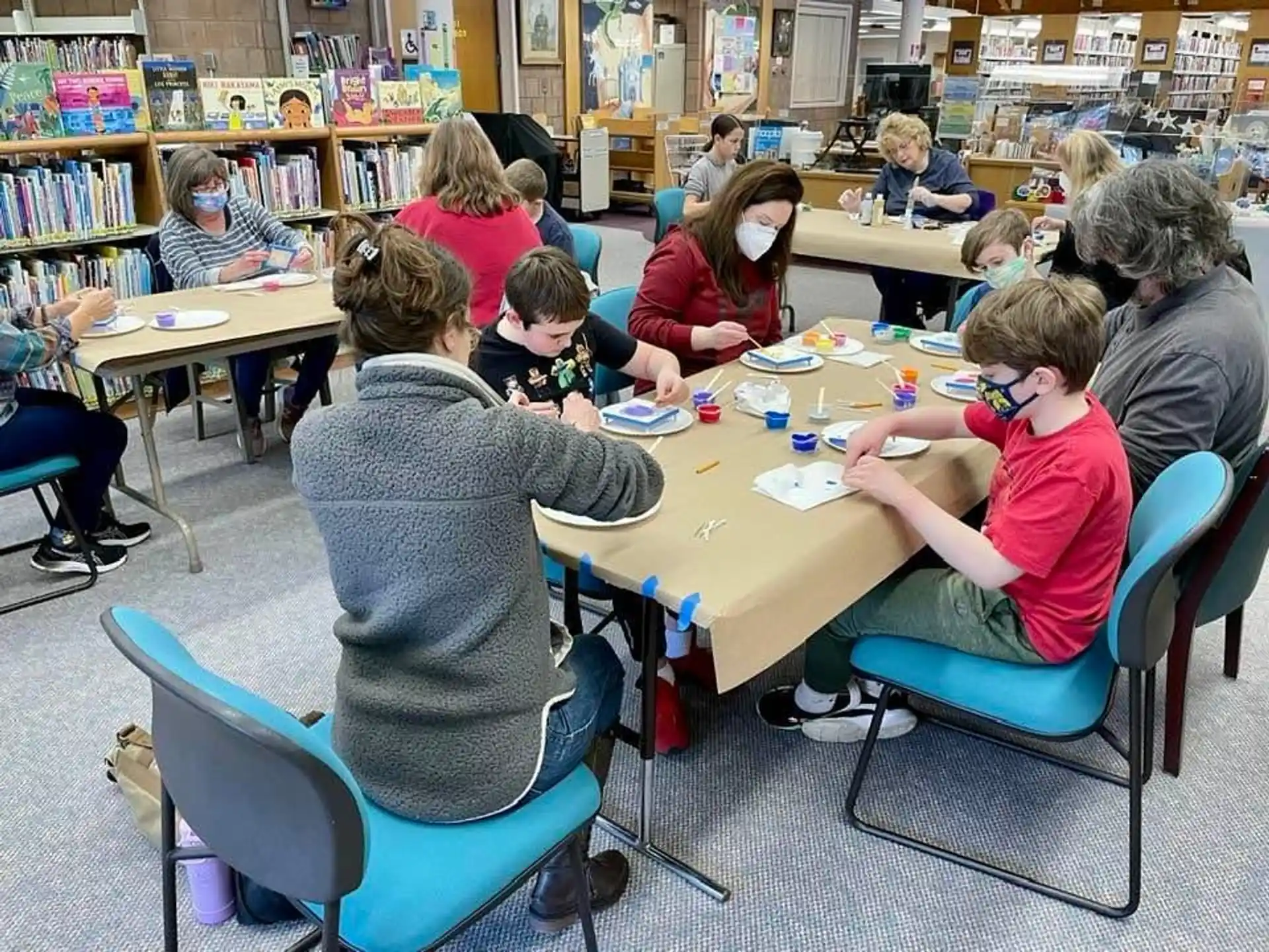 a group of people sitting at tables